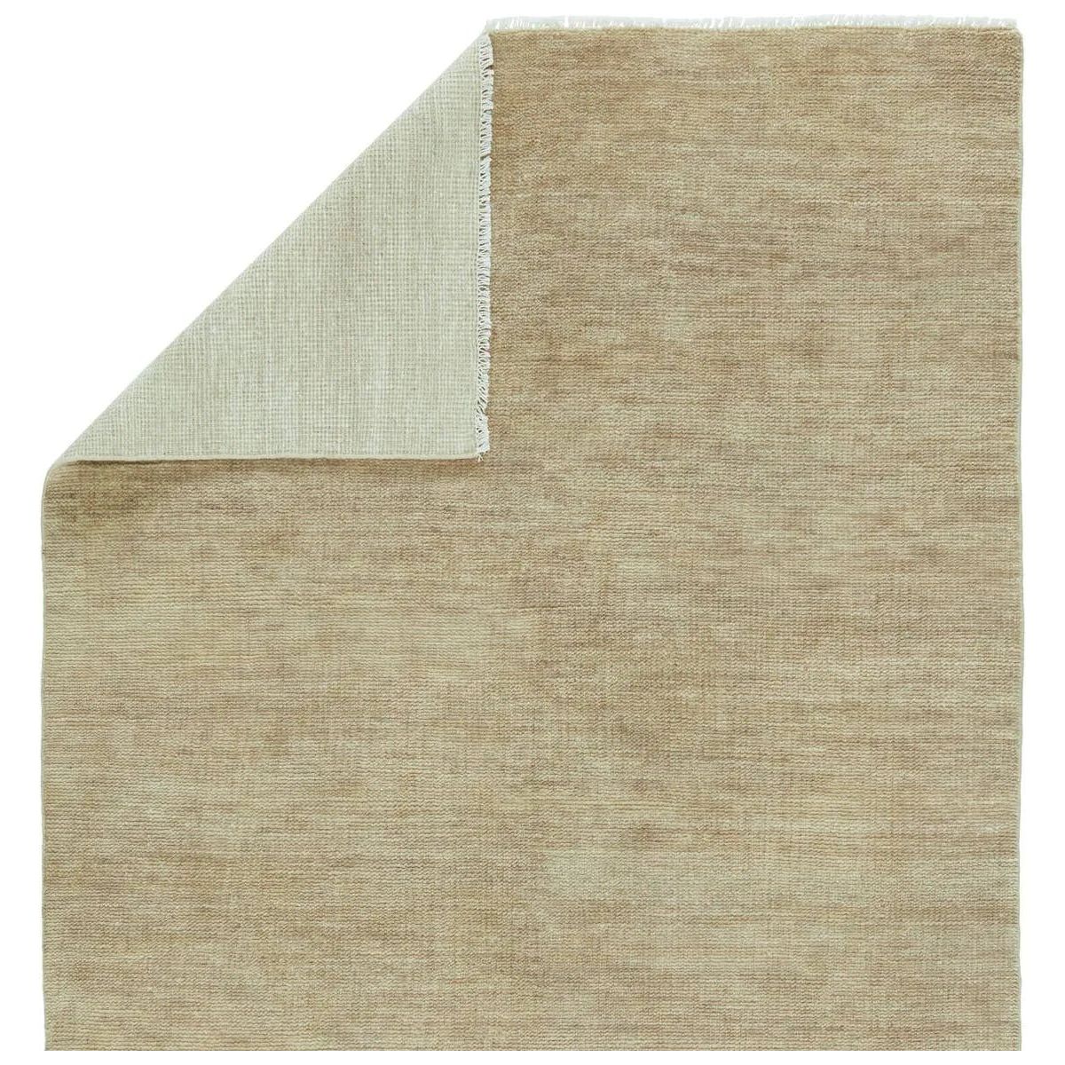 Featuring Saga Origin Hand-Knotted Rug by Jaipur Living at Amethyst Home. The sophisticated Saga Origin lends balance and a relaxed, grounding vibe to modern interiors. The Origin area rug anchors a space with a solid, subtly striated design in a dark taupe colorway. Hand knotted by skilled artisans, this durable wool accent marries simplicity and luxury with. Amethyst Home provides interior design, new home construction design consulting, vintage area rugs, and lighting in the Houston metro area.