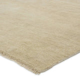 Featuring Saga Origin Hand-Knotted Rug by Jaipur Living at Amethyst Home. The sophisticated Saga Origin lends balance and a relaxed, grounding vibe to modern interiors. The Origin area rug anchors a space with a solid, subtly striated design in a neutral, ivory colorway. Hand knotted by skilled artisans, this durable wool accent marries simplicity and lux. Amethyst Home provides interior design, new home construction design consulting, vintage area rugs, and lighting in the Los Angeles metro area.