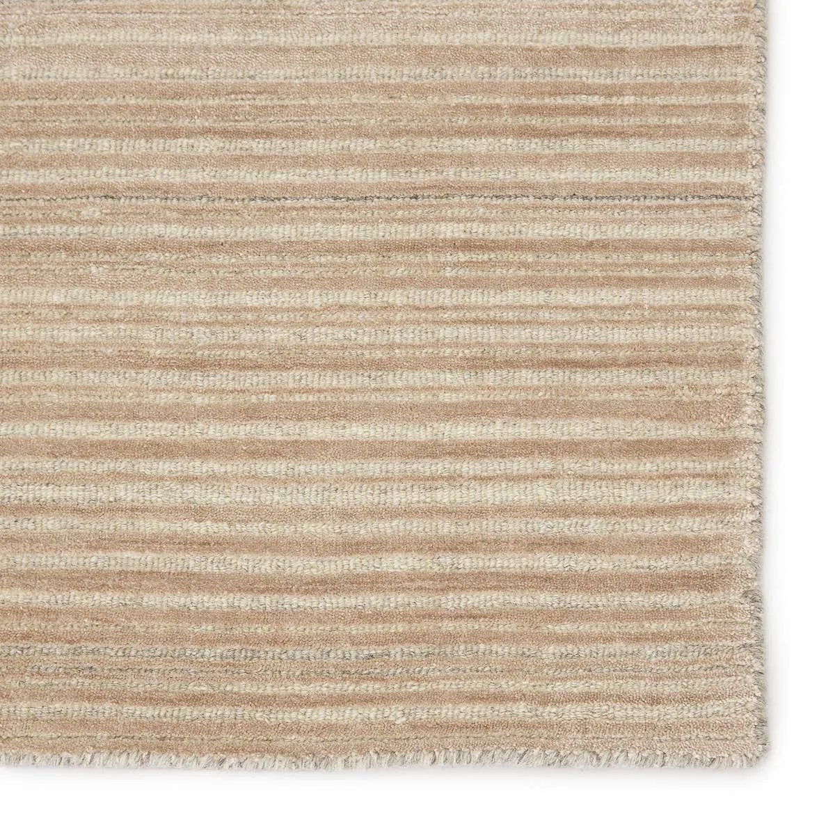 Featuring Second Sunset  Gradient Rug by Jaipur Living at Amethyst Home. The easy-to-decorate, earthy tones of the Second Sunset Gradient prove that simplicity can sometimes be striking. The Gradient rug is hand loomed of durable wool and jasmine for a sumptuous and inviting hand. The variation in the rosy tan, cream, and gray tones of this lustrous rug creat. Amethyst Home provides interior design, new home construction design consulting, vintage area rugs, and lighting in the Houston metro area.