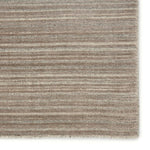 Featuring Second Sunset  Gradient Rug by Jaipur Living at Amethyst Home. The easy-to-decorate, earthy tones of the Second Sunset Gradient prove that simplicity can sometimes be striking. The Gradient rug is hand loomed of durable wool and jasmine for a sumptuous and inviting hand. The variation in the cool brown, gray, and light taupe tones of this lustrous. Amethyst Home provides interior design, new home construction design consulting, vintage area rugs, and lighting in the San Diego metro area.