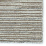 Featuring Second Sunset  Gradient Rug by Jaipur Living at Amethyst Home. The easy-to-decorate, earthy tones of the Second Sunset Gradient prove that simplicity can sometimes be striking. The Gradient rug is hand loomed of durable wool and jasmine for a sumptuous and inviting hand. The variation in the light taupe, ivory, and gray tones of this lustrous rug. Amethyst Home provides interior design, new home construction design consulting, vintage area rugs, and lighting in the Washington metro area.