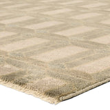 Featuring Vaila Hand-Knotted Rug by Jaipur Living at Amethyst Home. The Vaila design reinvents timeless geometric grid patterns, fusing classic charm with a modern edge. Soft beige tones elevate any mid-century modern space, while naturally stain-resistant wool handles medium-traffic areas, kids, and pets with ease. A durable yet stylish foundation, this p. Amethyst Home provides interior design, new home construction design consulting, vintage area rugs, and lighting in the Washington metro area.