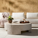 Featuring Everett Matte Stone Outdoor Coffee Table by Four Hands at Amethyst Home. A textured, white concrete coffee table perfect for modern and wabi sabi style.  The table has a matte texture and is perfect for indoors or outdoors.Overall Dimensions: 48.00"w x 48.00"d x 16.25"hWeight : 277.78 lbsMaterials : Concrete. Amethyst Home provides interior design, new construction, custom furniture, and area rugs in the Des Moines metro area