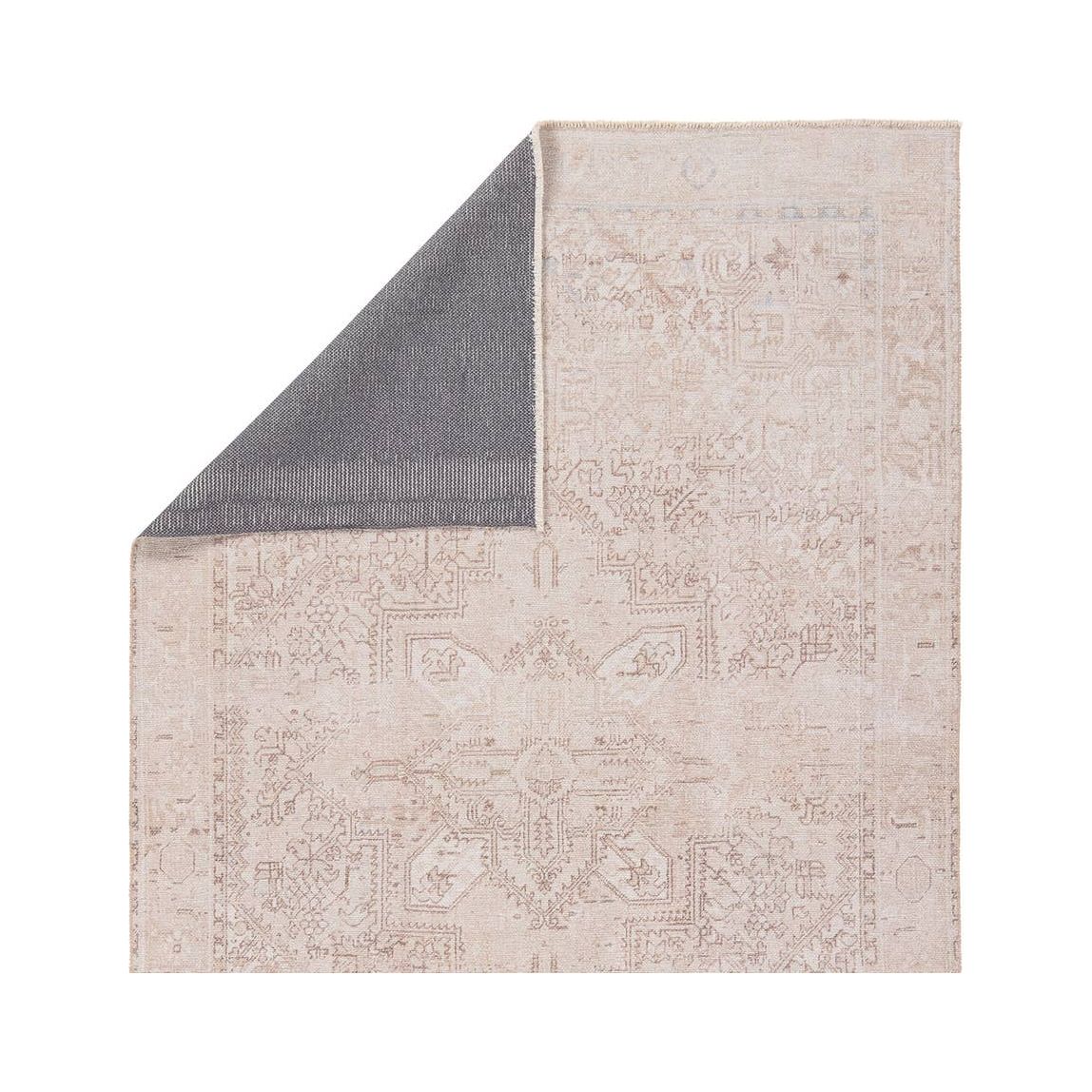 Featuring Lumal Tymabe Rug by Jaipur Living at Amethyst Home. Distressed, vintage designs offer an elevated tone for the Lumal Collection. The Tymabe rug features an updated traditional inspired medallion, geometric border, and intricate detailing in tones of tan, cream, and slate. This machine washable rug is stain resistant and easy to clean, perfect for .  Amethyst Home provides interior design, new home construction design consulting, vintage area rugs, and lighting in the Portland metro area.