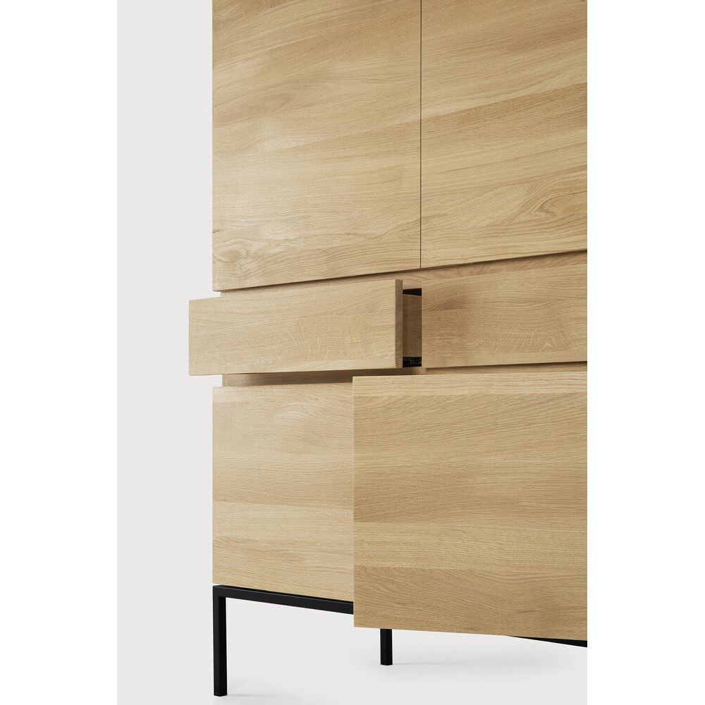 Featuring Ligna Black Oak Cupboard by Ethnicraft at Amethyst Home. A clean and pure look with black metal legs, the Ligna storage cupboard offers a perfect storage facility for the kitchen, living room or dining room.Weight : 293 lbs Dimensions: 20" W x 43.5" L x 64" H. Amethyst Home provides interior design, new construction, custom furniture, and area rugs in the Los Angeles metro area