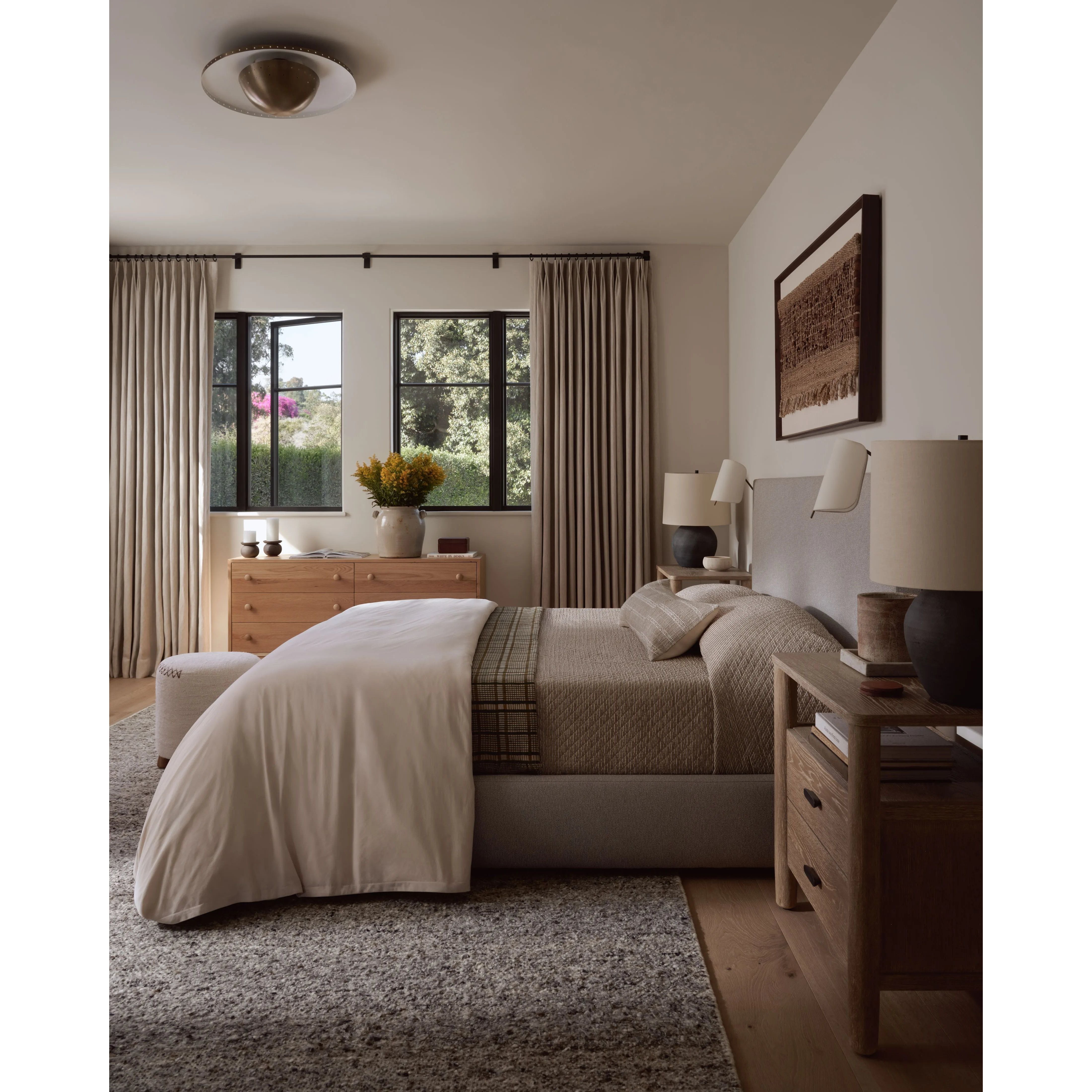 Featuring Amber Lewis x Loloi Suki Ivory / Granite Rug by Loloi at Amethyst Home. The Suki Collection by Amber Lewis x Loloi is an irresistibly plush area rug inspired by traditional Moroccan designs. Subtle linear patterns add depth to the sink-your-feet-in pile, while the edges reveal the rugs base pile for a sophisticated finishing touch. The Suki Collec. Amethyst Home provides interior design, new home construction design consulting, vintage area rugs, and lighting in the Charlotte metro area.