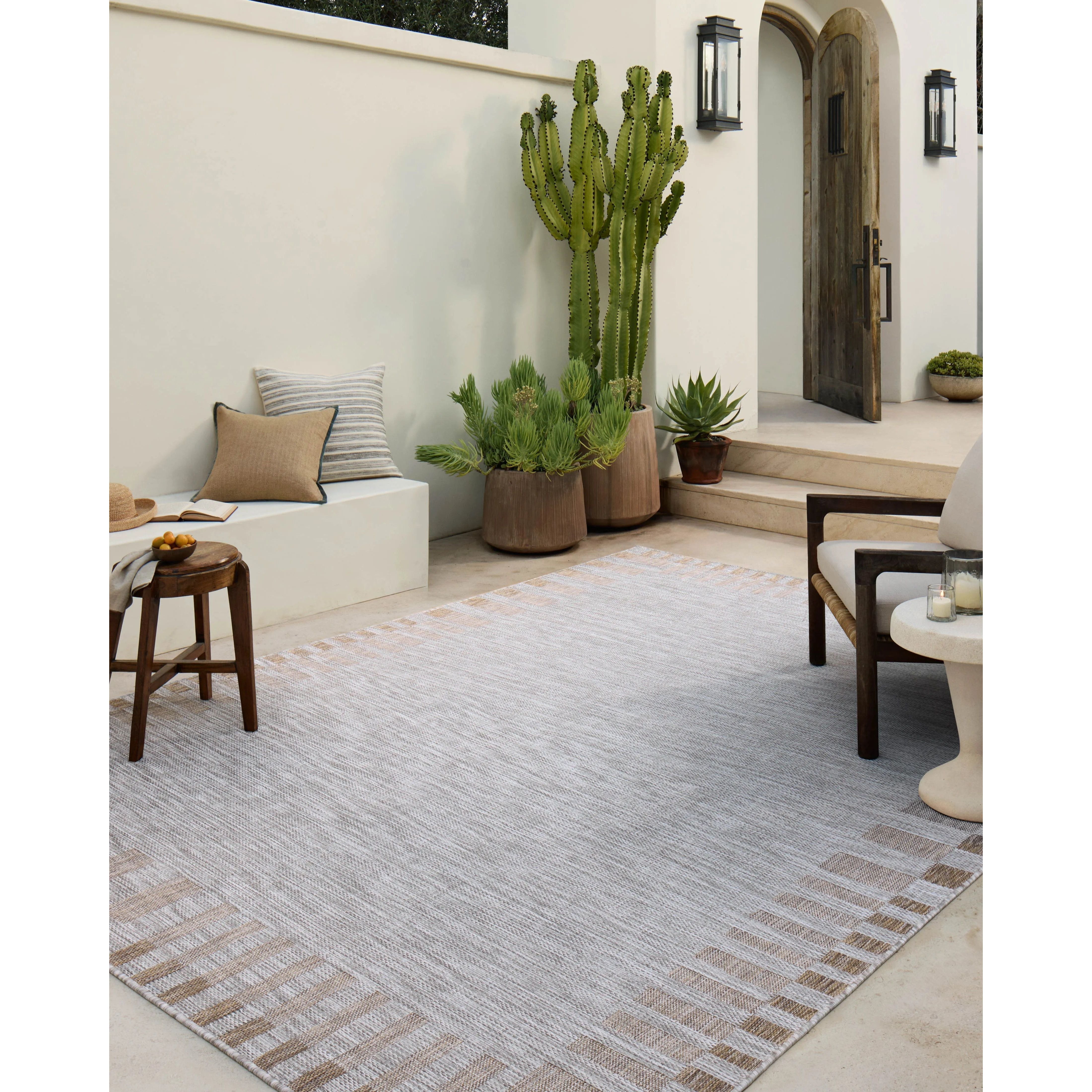 Featuring Amber Lewis x Loloi Topanga Silver / Natural Rug by Loloi at Amethyst Home. Inspired by the scenic mountain town in California, the Topanga Collection is an indoor/outdoor rug made of durable polypropylene that resembles natural fibers but is much more ready for sun, rain, and high-traffic use. The rug's modern construction also makes it easy to . Amethyst Home provides interior design, new home construction design consulting, vintage area rugs, and lighting in the Alpharetta metro area.