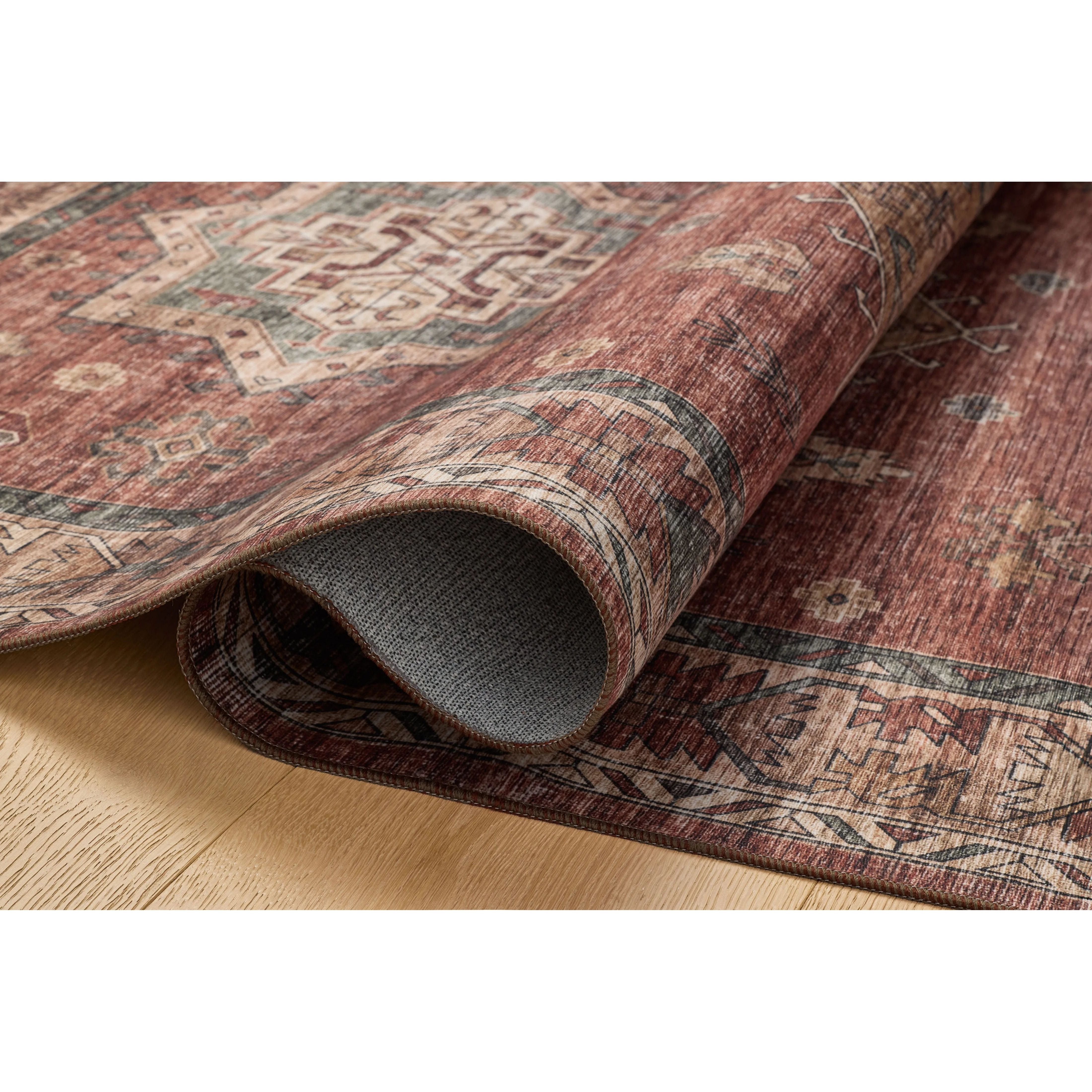 Featuring Anniston Machine Washable Spice / Multi Rug by Loloi at Amethyst Home. The Anniston Collection is a washable rug with traditional motifs in beautifully saturated and distressed tones. This durable area rug is power-loomed of polyester in China and designed for the busiest rooms of the home—living rooms, bedrooms, kitchens, hallways, and more. I. Amethyst Home provides interior design, new home construction design consulting, vintage area rugs, and lighting in the Laguna Beach metro area.