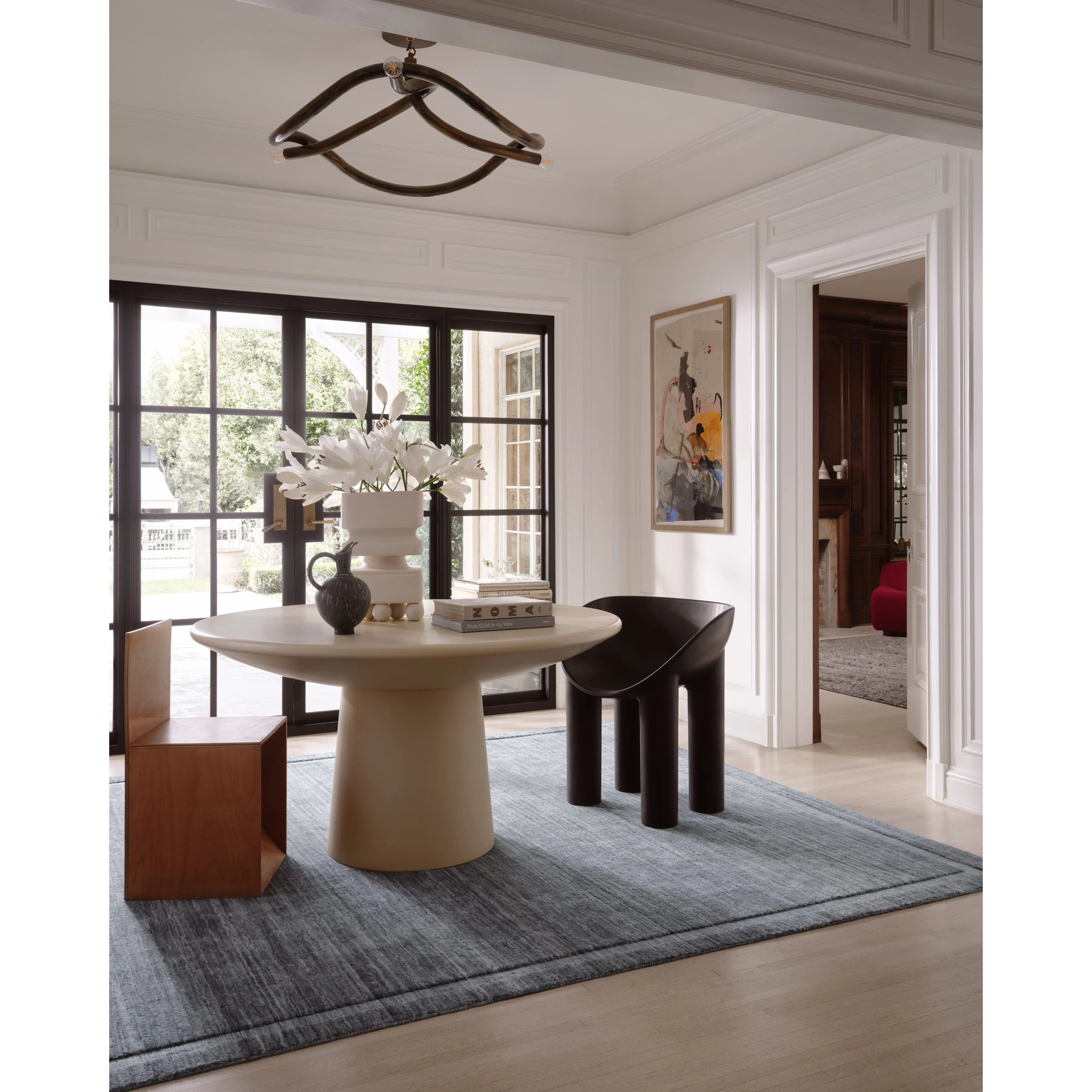 Featuring Brigette Romanek x Loloi Orly Denim Rug by Loloi at Amethyst Home. Irresistible to walk upon, the Dana Denim Rug by Brigette Romanek x Loloi has a high-low texture that alternates between a subtly shaggy pile and a soft base. Horizontal broken stripes give the area rug a fresh and energized structure, while a finish of fringe along the edges accen. Amethyst Home provides interior design, new home construction design consulting, vintage area rugs, and lighting in the Charlotte metro area.