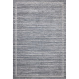 Featuring Brigette Romanek x Loloi Orly Denim Rug by Loloi at Amethyst Home. Irresistible to walk upon, the Dana Denim Rug by Brigette Romanek x Loloi has a high-low texture that alternates between a subtly shaggy pile and a soft base. Horizontal broken stripes give the area rug a fresh and energized structure, while a finish of fringe along the edges accent. Amethyst Home provides interior design, new home construction design consulting, vintage area rugs, and lighting in the Portland metro area.