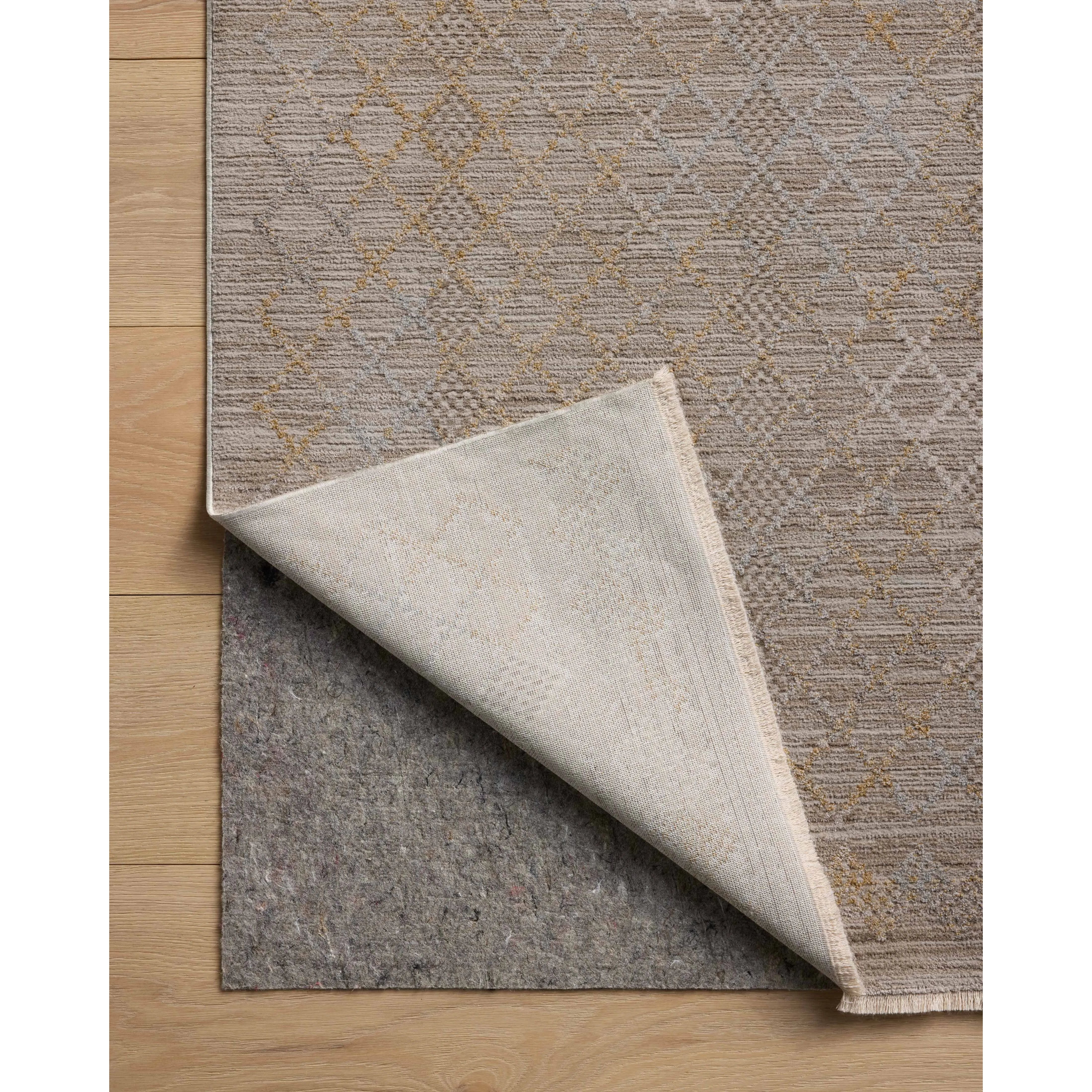 Featuring Cali Amber Lewis x Loloi  Taupe / Multi Rug by Loloi at Amethyst Home. The Cali Collection by Amber Lewis x Loloi is a light-toned area rug with a casual geometric pattern that lends a neutral pattern to any space. Cali is power-loomed of polyester in Turkey for easy-to-clean, no-shed durability in high-traffic areas. This collection is also OEKO-T. Amethyst Home provides interior design, new home construction design consulting, vintage area rugs, and lighting in the Monterey metro area.