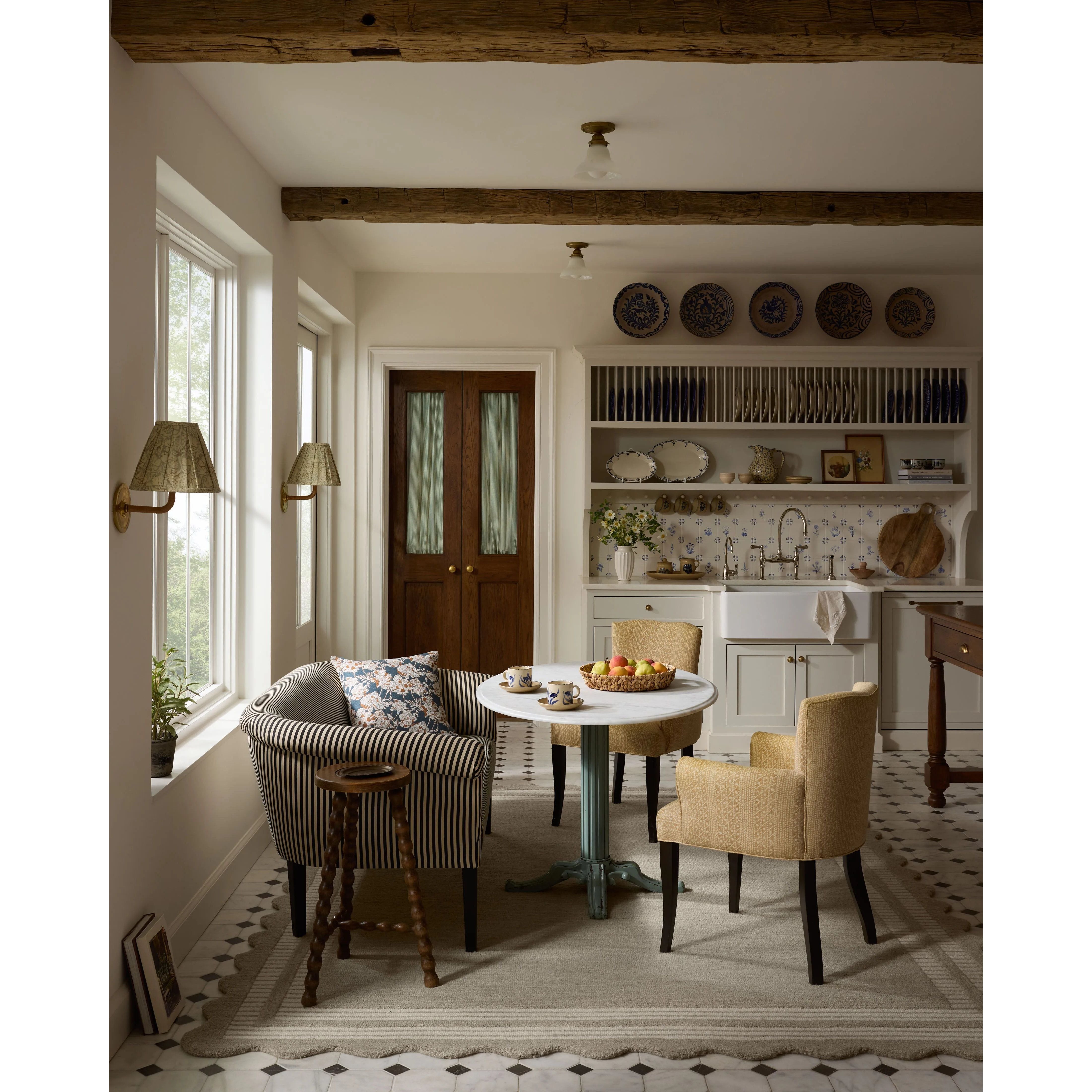 Featuring Chris Loves Julia × Loloi Scottie Fog / Ivory Rug by Loloi at Amethyst Home. The Scottie Collection from Chris Loves Julia x Loloi is a hand-tufted wool area rug with a playful scalloped edge and lower-pile, striped border for a touch of structure. The rugs overall pile is thick and plush, available in easygoing earth tones and neutral colorways. . Amethyst Home provides interior design, new home construction design consulting, vintage area rugs, and lighting in the Calabasas metro area.