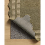 Featuring Chris Loves Julia × Loloi Scottie Olive / Pebble Rug by Loloi at Amethyst Home. The Scottie Collection from Chris Loves Julia x Loloi is a hand-tufted wool area rug with a playful scalloped edge and lower-pile, striped border for a touch of structure. The rugs overall pile is thick and plush, available in easygoing earth tones and neutral color. Amethyst Home provides interior design, new home construction design consulting, vintage area rugs, and lighting in the Laguna Beach metro area.