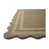 Featuring Chris Loves Julia × Loloi Scottie Olive / Pebble Rug by Loloi at Amethyst Home. The Scottie Collection from Chris Loves Julia x Loloi is a hand-tufted wool area rug with a playful scalloped edge and lower-pile, striped border for a touch of structure. The rugs overall pile is thick and plush, available in easygoing earth tones and neutral colorways. T. Amethyst Home provides interior design, new home construction design consulting, vintage area rugs, and lighting in the Miami metro area.