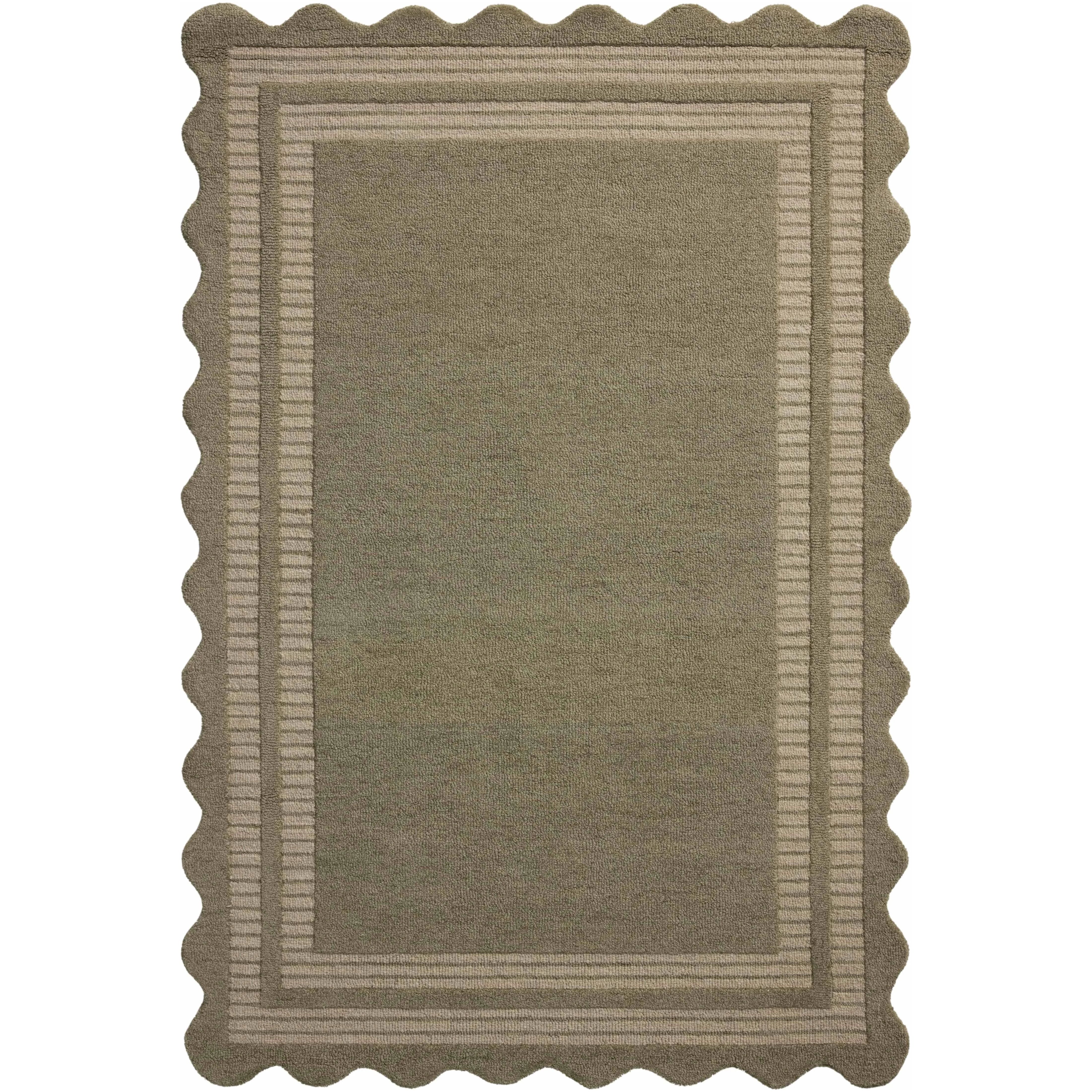 Featuring Chris Loves Julia × Loloi Scottie Olive / Pebble Rug by Loloi at Amethyst Home. The Scottie Collection from Chris Loves Julia x Loloi is a hand-tufted wool area rug with a playful scalloped edge and lower-pile, striped border for a touch of structure. The rugs overall pile is thick and plush, available in easygoing earth tones and neutral colorways. Amethyst Home provides interior design, new home construction design consulting, vintage area rugs, and lighting in the Monterey metro area.