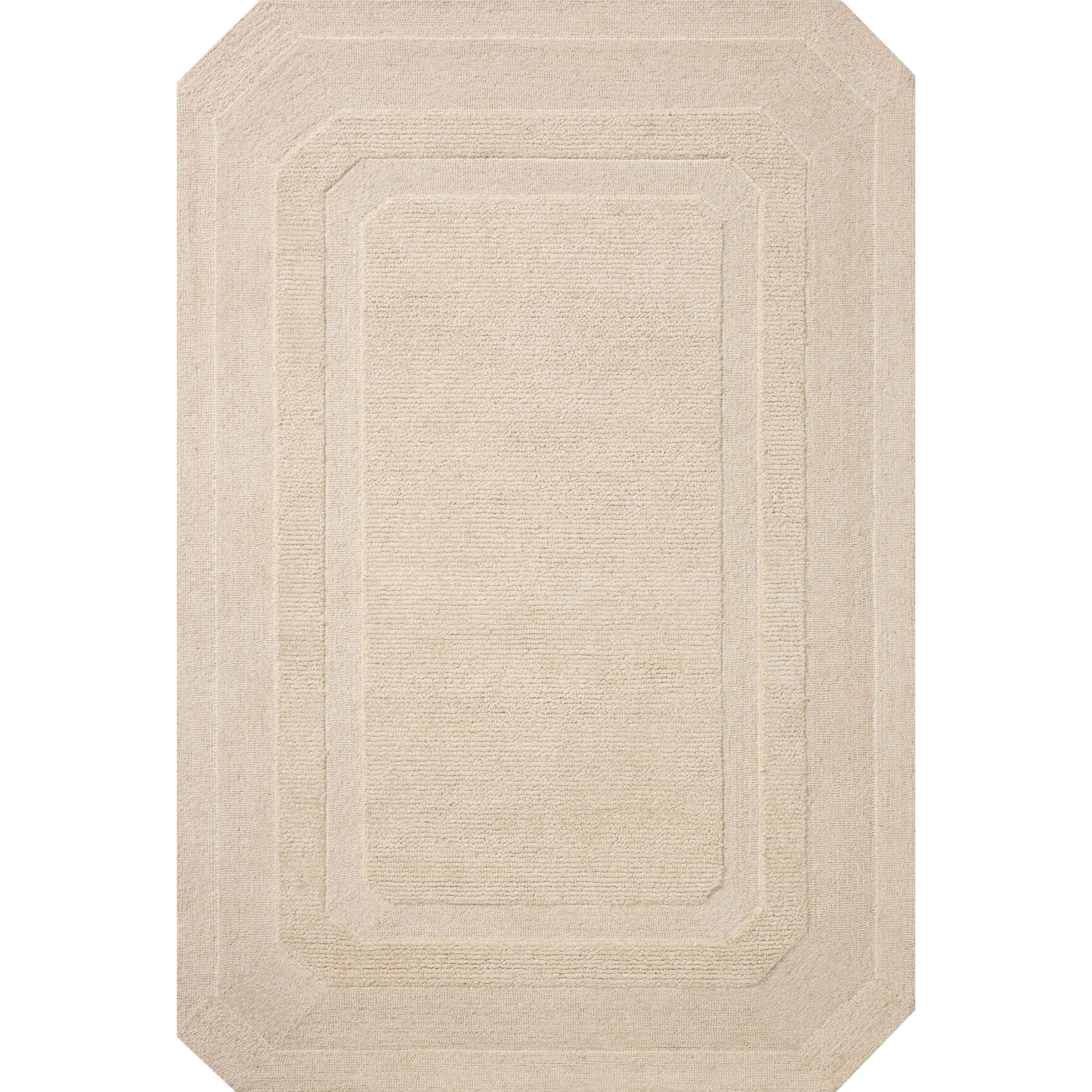 Featuring Clayton Oatmeal Rug by Loloi at Amethyst Home. The Clayton Collection is a hand-tufted, solid-toned wool area rug with angled edges for a modern twist on traditional home decor. Clayton adds even more dimension with a luxurious high/low looped pile that is perfect in living rooms, bedrooms, and more. This collection is made in India and Goodweav. Amethyst Home provides interior design, new home construction design consulting, vintage area rugs, and lighting in the Kansas City metro area.