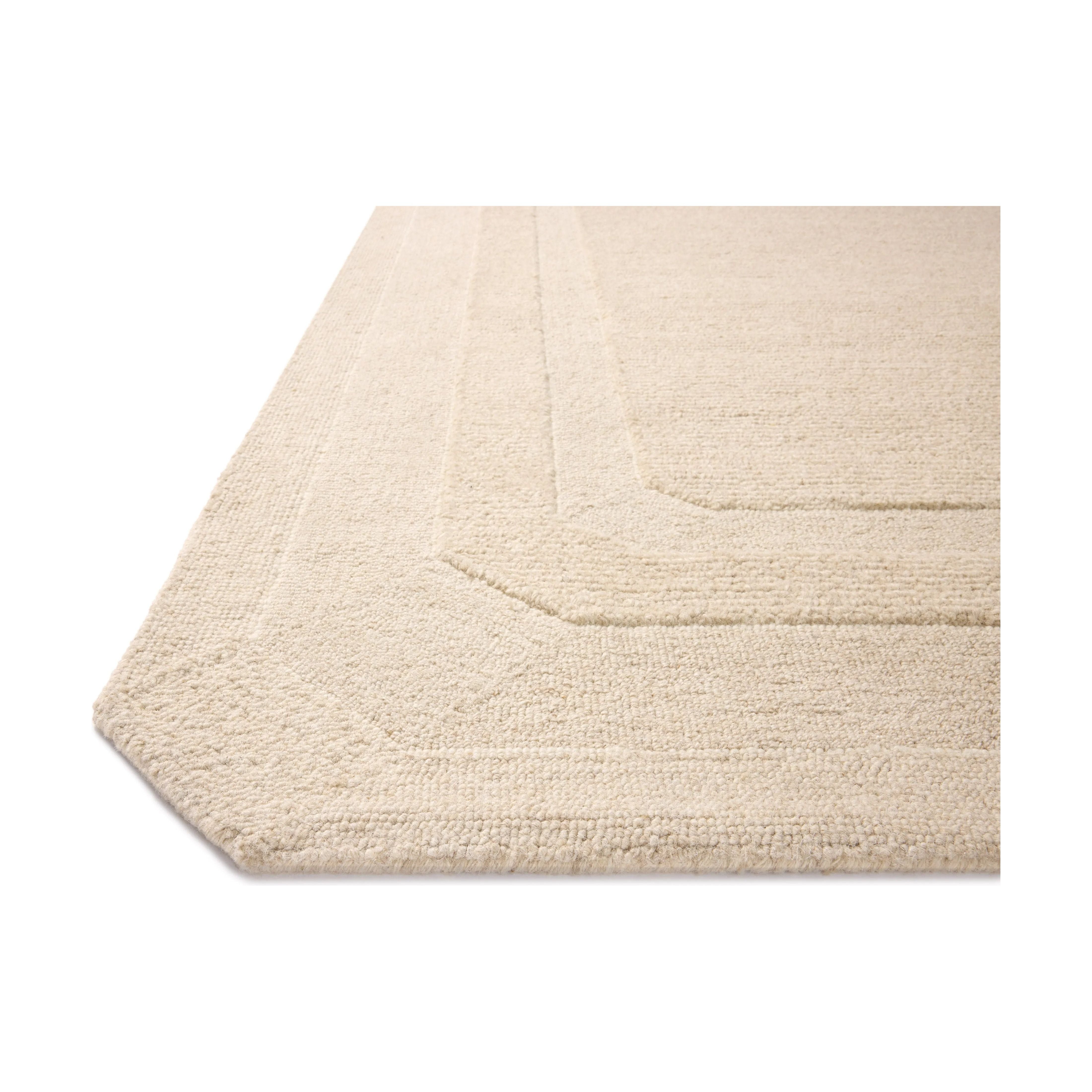 Featuring Clayton Oatmeal Rug by Loloi at Amethyst Home. The Clayton Collection is a hand-tufted, solid-toned wool area rug with angled edges for a modern twist on traditional home decor. Clayton adds even more dimension with a luxurious high/low looped pile that is perfect in living rooms, bedrooms, and more. This collection is made in India and Goodwe. Amethyst Home provides interior design, new home construction design consulting, vintage area rugs, and lighting in the Winter Garden metro area.