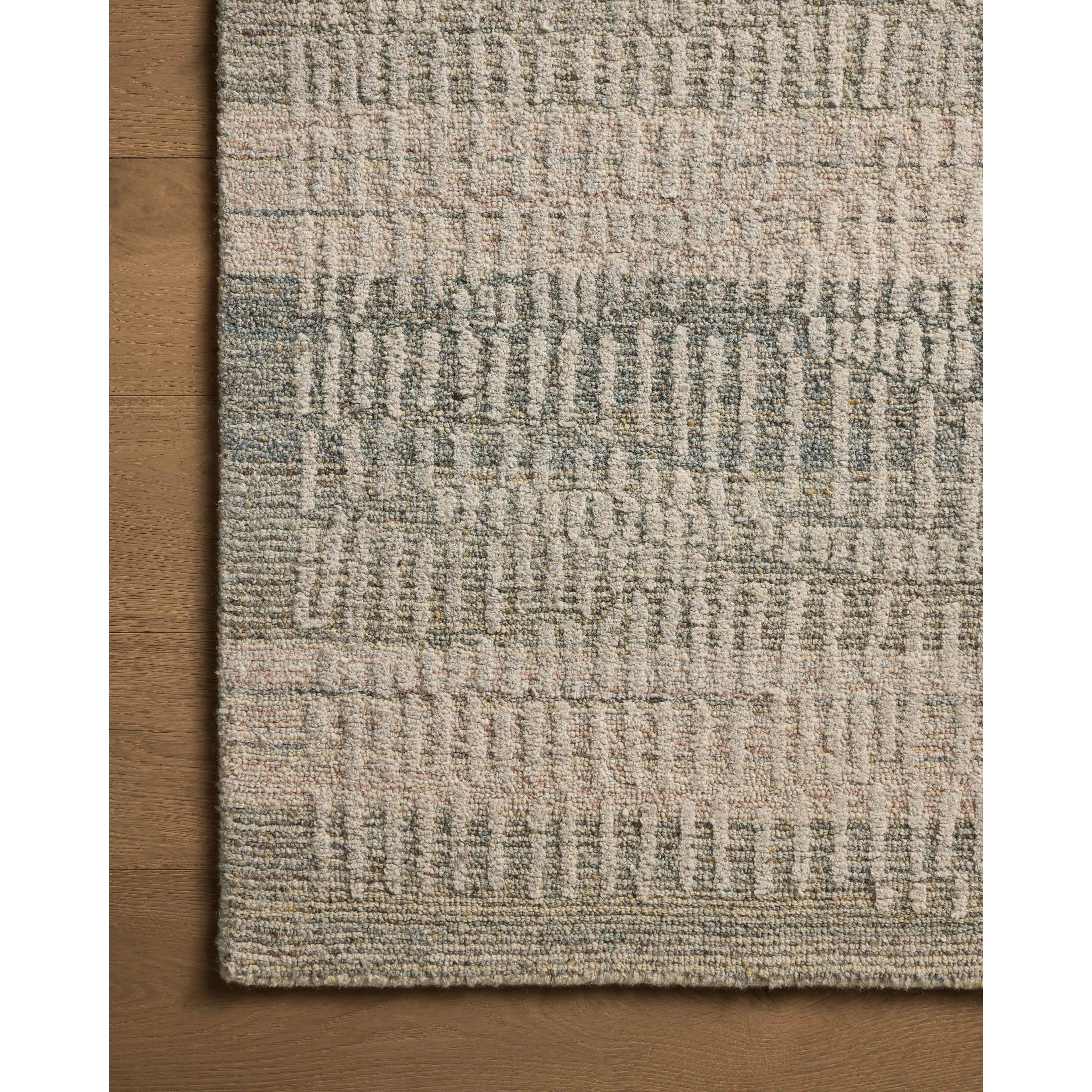 Featuring Elias Earth / Blush Rug by Loloi at Amethyst Home. The Elias Earth / Blush Rug is a hand-tufted wool area rug with lively graphic patterns in earth and stone tones. There’s a unique texture to the rug made by over-tufting, in which a design is hand-tufted over a tufted base, creating a subtle high-low pile. This collection is made in India and GoodWea. Amethyst Home provides interior design, new home construction design consulting, vintage area rugs, and lighting in the Tampa metro area.