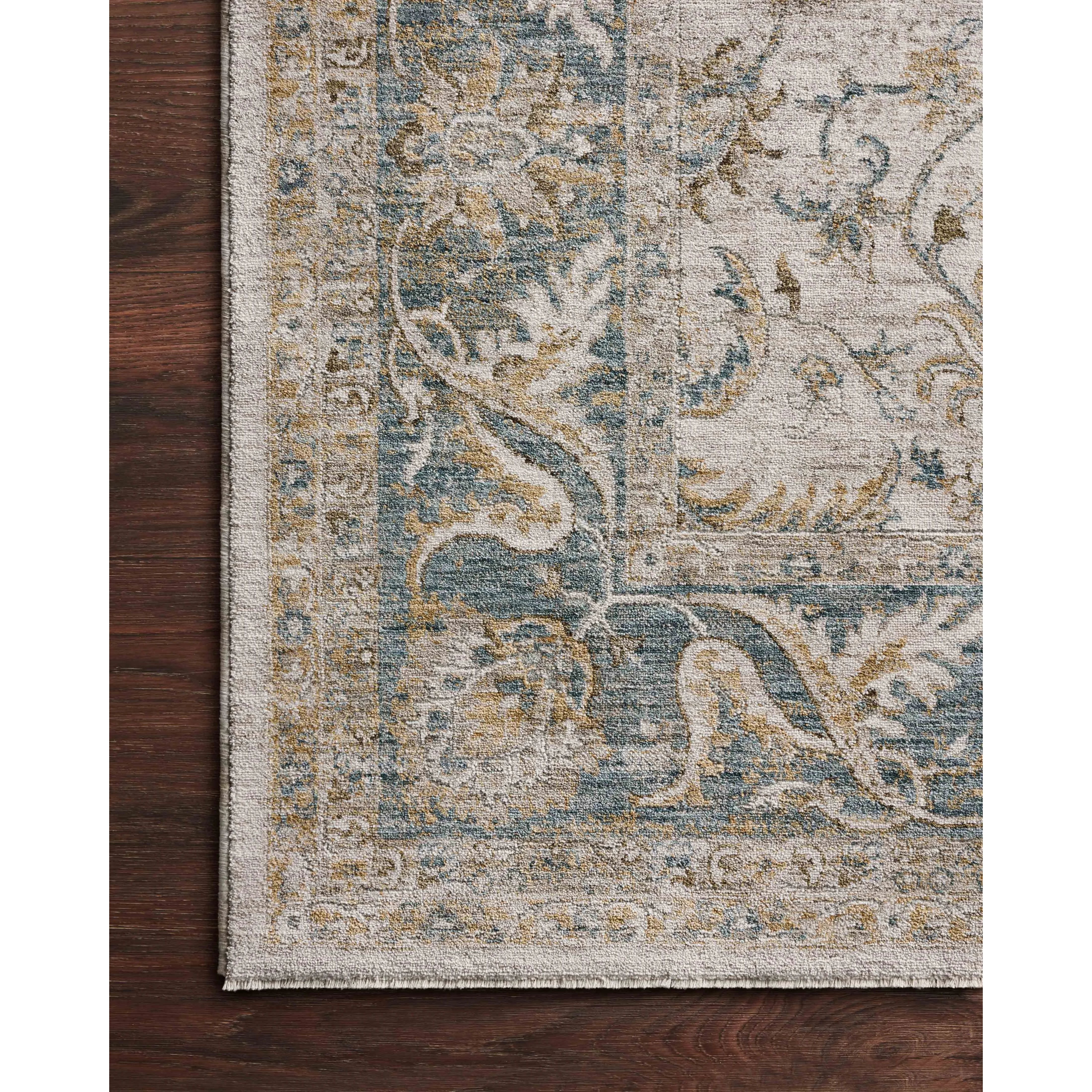 Featuring Gaia Natural / Ocean Rug by Loloi at Amethyst Home. Power-loomed in Turkey of 100% polyester pile, the Gaia Natural / Ocean Rug displays a classic color palette and a mix of abstract and traditional-inspired motifs. With a variation of warm and cool tones, mix of modern and classic designs, Gaia offers an option for all types of styles.100% Po. Amethyst Home provides interior design, new home construction design consulting, vintage area rugs, and lighting in the Winter Garden metro area.