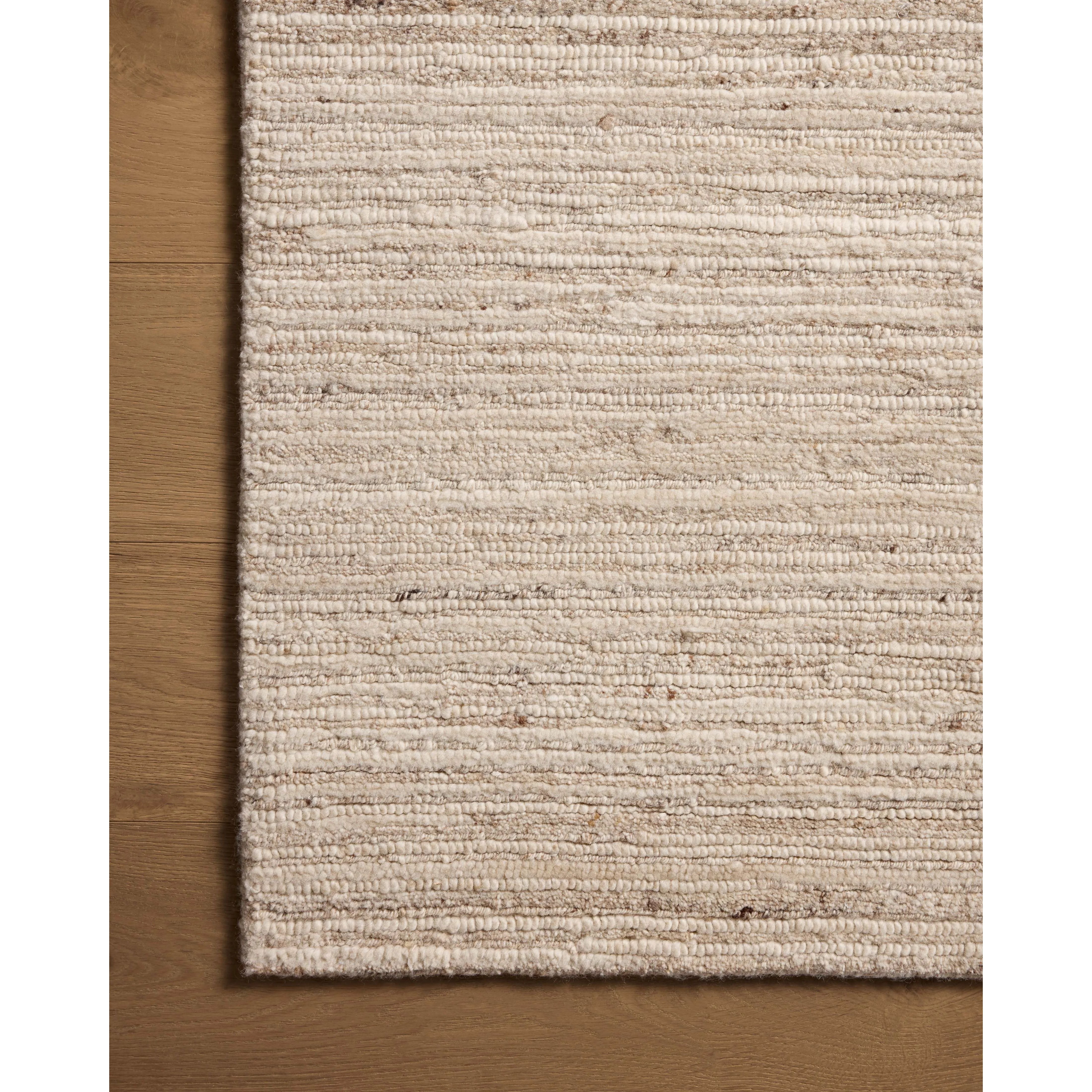 Featuring Greer Cream / Pebble Hand-Knotted Rug by Loloi at Amethyst Home. The Greer Collection is a hand-knotted wool area rug with a subtle interplay of vertical broken lines across a horizontally ribbed base. The rug's light, heathered palette and durable, knotted construction make it a welcome addition to living rooms, bedrooms, and more. This collectio. Amethyst Home provides interior design, new home construction design consulting, vintage area rugs, and lighting in the San Diego metro area.