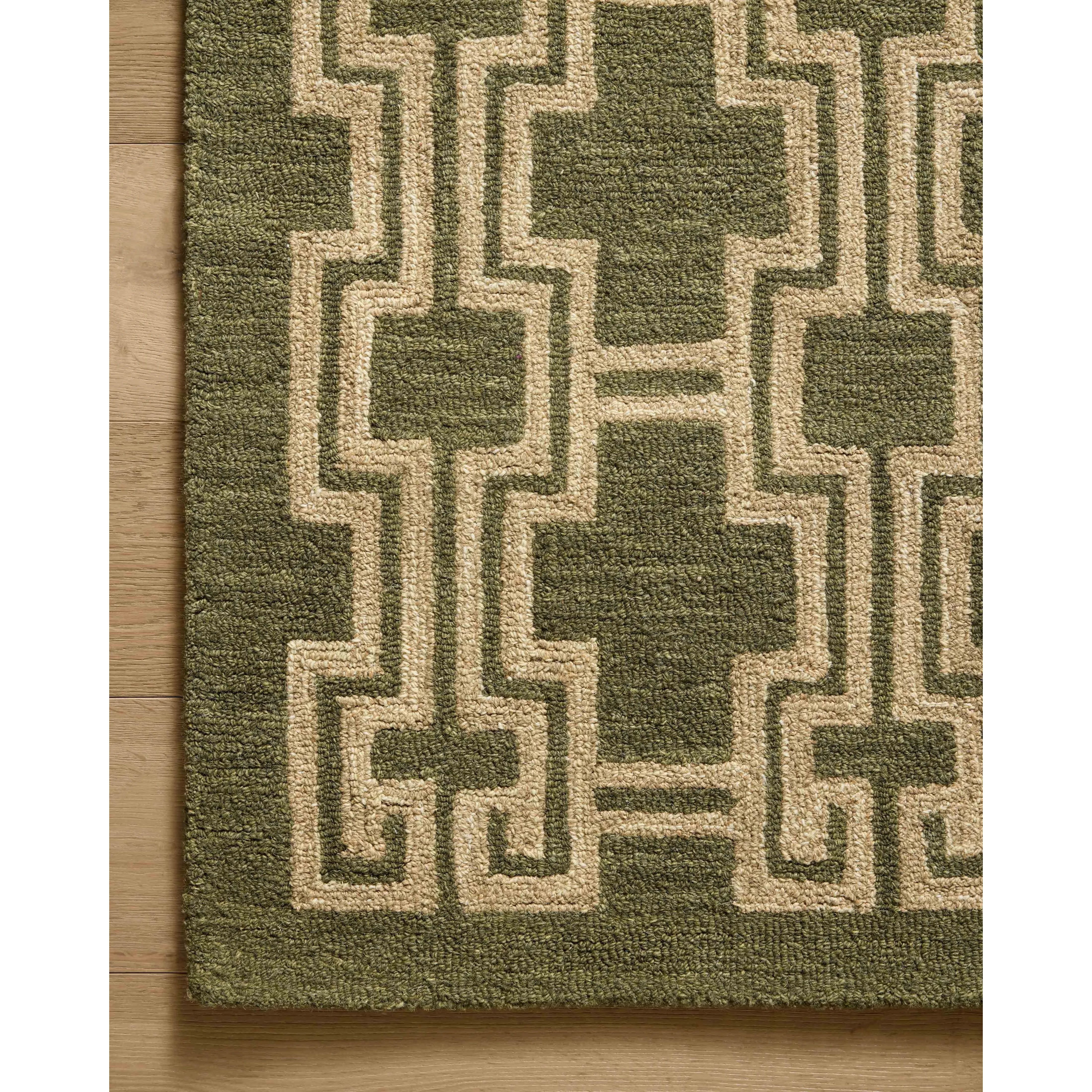 Featuring Jeremiah Brent x Loloi Barrow Moss / Beige Rug by Loloi at Amethyst Home. The Barrow Collection by Jeremiah Brent x Loloi is a hand-tufted area rug with a bold linear design inspired by modern art and classical architecture. The rugs pile is a blend of wool and jute for a stable, substantial feel that can ground living rooms, dining rooms, bedroom. Amethyst Home provides interior design, new home construction design consulting, vintage area rugs, and lighting in the Charlotte metro area.