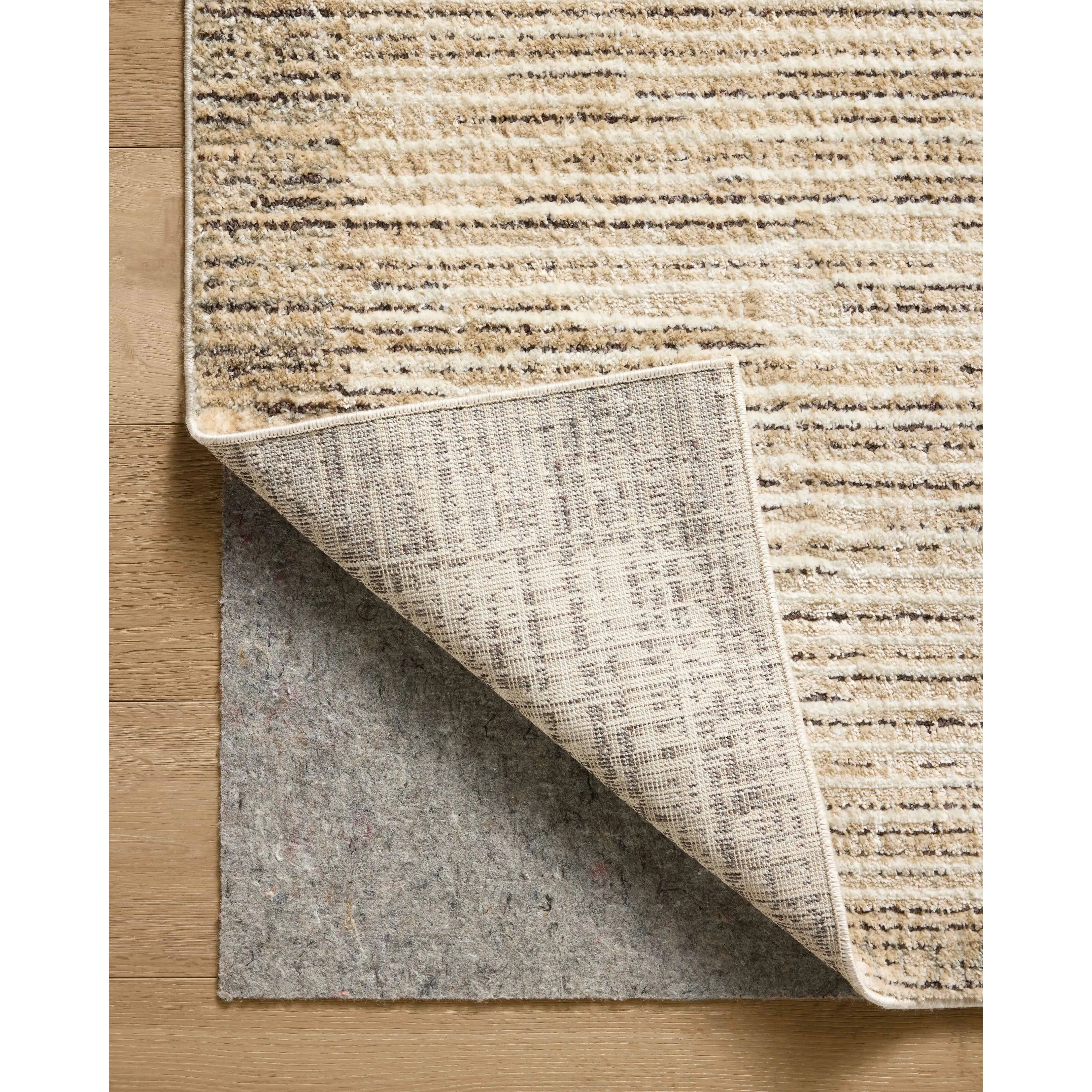 Featuring Jeremiah Brent x Loloi Bleecker Sand / Charcoal Rug by Loloi at Amethyst Home. The Bleecker Collection by Jeremiah Brent x Loloi is a soft, power-loomed rug in warm colorways that change in different lighting. With high-contrast linear patterns and careful distressing, Bleecker represents Jeremiah love of modern design. This collection is made of pol. Amethyst Home provides interior design, new home construction design consulting, vintage area rugs, and lighting in the Austin metro area.