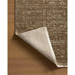 Featuring Haywood Brown Rug by Loloi at Amethyst Home. The Haywood Collection is an easy-to-clean, earth-toned area rug with a subtly distressed traditional design. Haywood is power-loomed of polyester in Turkey, a durable area rug for a living room, bedroom, dining room, or other high-traffic spaces.  Power Loomed  HYD-01 Loloi Ii x Loloi Brown. Amethyst Home provides interior design, new home construction design consulting, vintage area rugs, and lighting in the Winter Garden metro area.