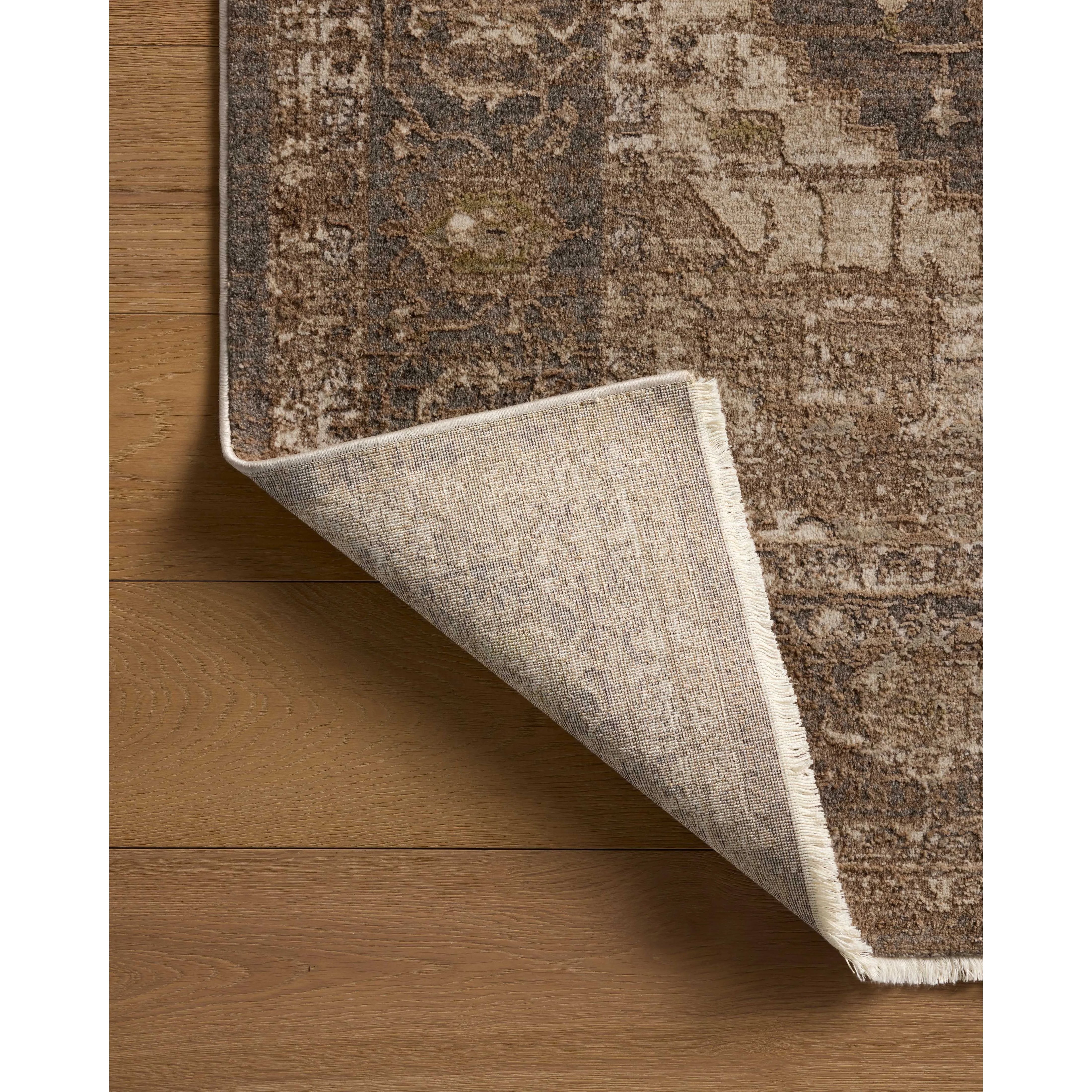 Featuring Haywood Mocha Rug by Loloi at Amethyst Home. The Haywood Collection is an easy-to-clean, earth-toned area rug with a subtly distressed traditional design. Haywood is power-loomed of polyester in Turkey, a durable area rug for a living room, bedroom, dining room, or other high-traffic spaces.  Power Loomed  HYD-03 Loloi Ii x Loloi Mocha. Amethyst Home provides interior design, new home construction design consulting, vintage area rugs, and lighting in the Austin metro area.