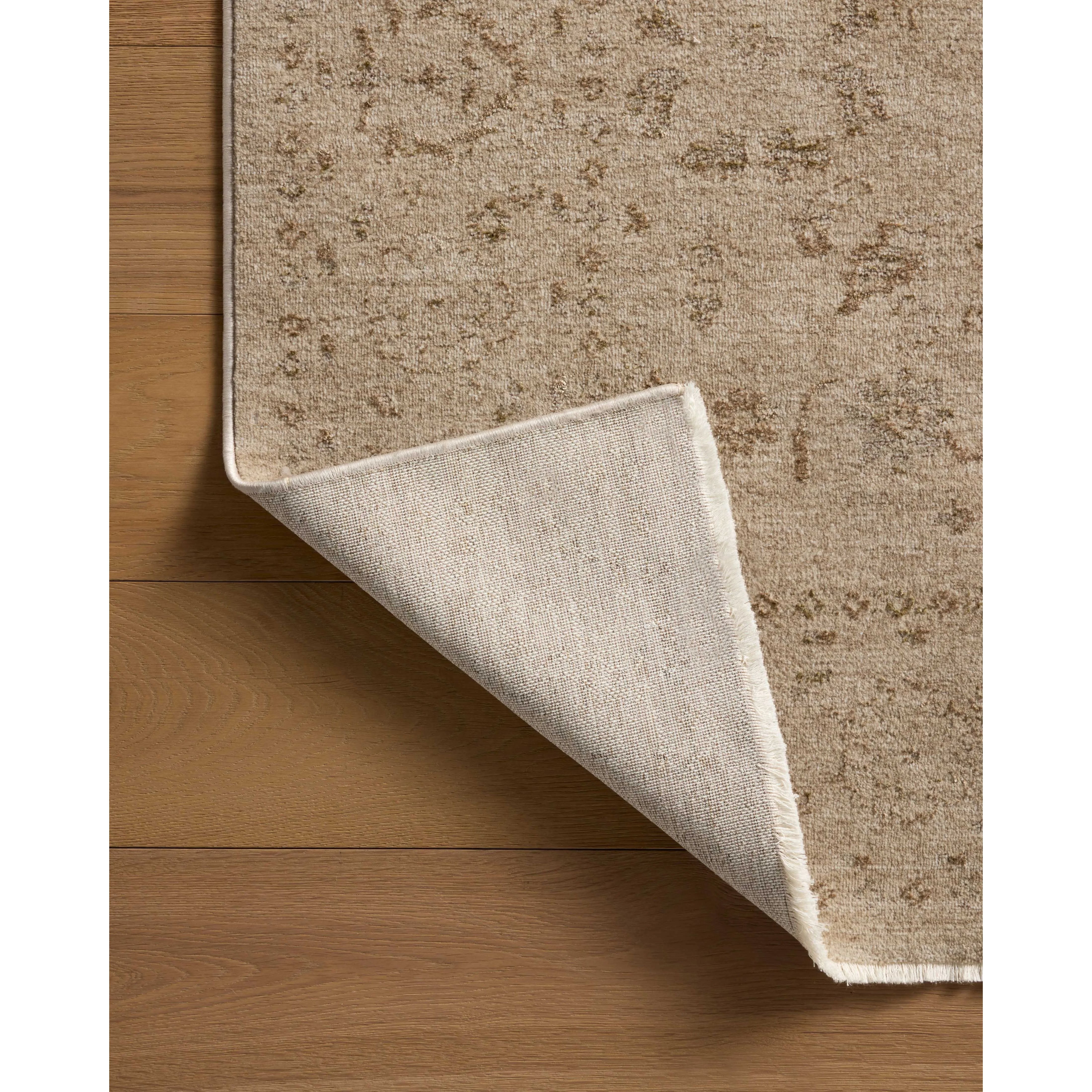 Featuring Haywood Natural Rug by Loloi at Amethyst Home. The Haywood Collection is an easy-to-clean, earth-toned area rug with a subtly distressed traditional design. Haywood is power-loomed of polyester in Turkey, a durable area rug for a living room, bedroom, dining room, or other high-traffic spaces.  Power Loomed  HYD-02 Loloi Ii x Loloi Natural. Amethyst Home provides interior design, new home construction design consulting, vintage area rugs, and lighting in the Salt Lake City metro area.