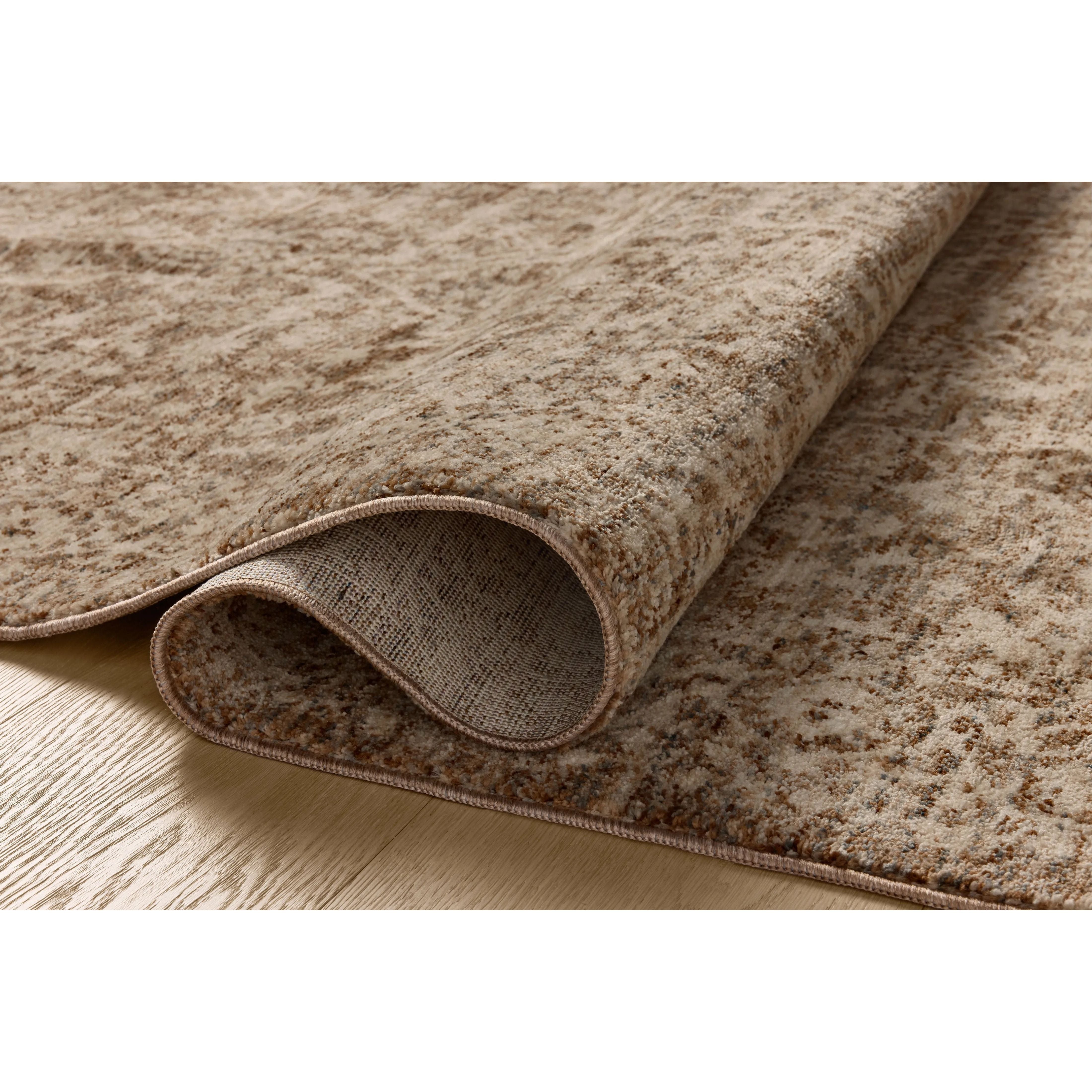 Featuring Newman Dark Taupe / Natural Rug by Loloi at Amethyst Home. The Newman Collection is a power-loomed area rug made of soft space-dyed polyester, which lends a subtle gradation of color in an easy-to-clean, no-shed construction. The versatile, vintage-inspired design features distressed white motifs against lovely and light tonal backgrounds. The . Amethyst Home provides interior design, new home construction design consulting, vintage area rugs, and lighting in the Laguna Beach metro area.