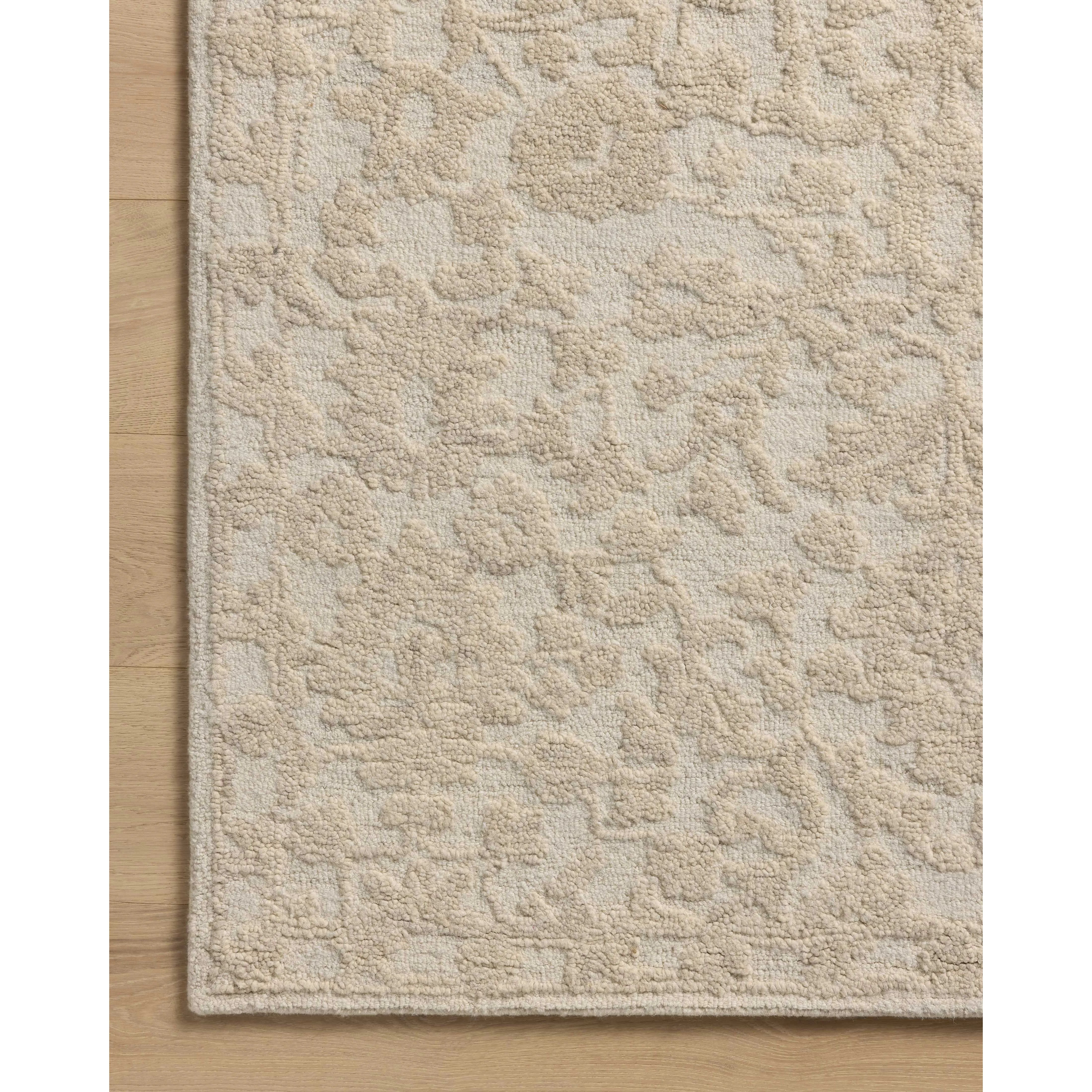 Featuring Prudence Cream / Ivory Rug by Loloi at Amethyst Home. The Prudence Collection is a hand-tufted area rug made of soft, space-dyed wool and cotton, which lends a subtle gradation of color throughout the floral design. The rugs background is low-looped, while the pattern is made with a chunky, higher loop to create even more depth in this sophisticated d. Amethyst Home provides interior design, new home construction design consulting, vintage area rugs, and lighting in the Miami metro area.