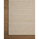 Featuring Sterling Ivory Rug by Loloi at Amethyst Home. Sophisticated ribbing runs across the Sterling Collection, a nicely textured area rug with a natural color palette rich in tonality. Sterling is hand-loomed of polyester that's refreshingly easy to clean and withstands high-traffic in living rooms, dining rooms, or bedrooms. This collection is made in . Amethyst Home provides interior design, new home construction design consulting, vintage area rugs, and lighting in the Nashville metro area.