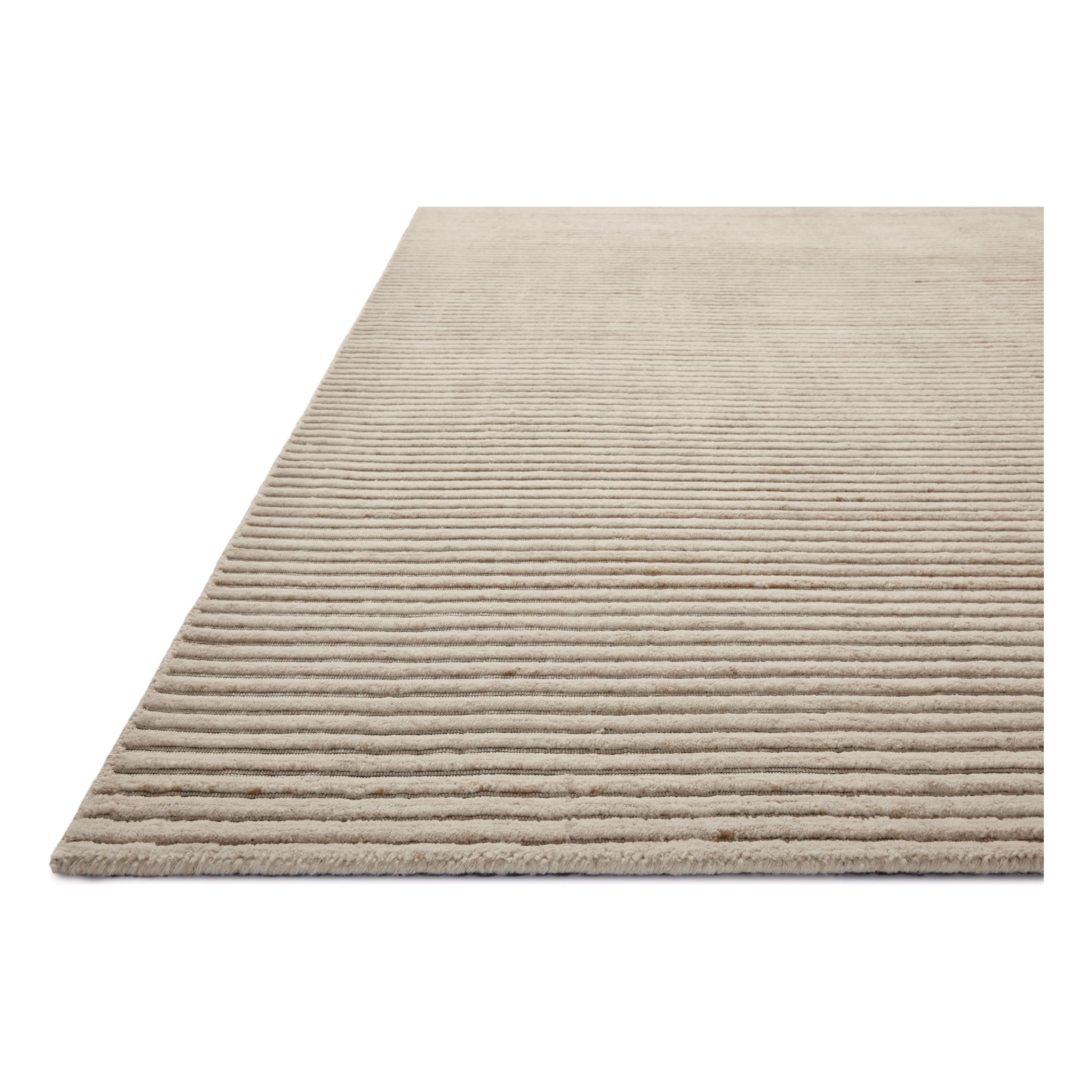 Featuring Sterling Ivory Rug by Loloi at Amethyst Home. Sophisticated ribbing runs across the Sterling Collection, a nicely textured area rug with a natural color palette rich in tonality. Sterling is hand-loomed of polyester that's refreshingly easy to clean and withstands high-traffic in living rooms, dining rooms, or bedrooms. This collection is made in. Amethyst Home provides interior design, new home construction design consulting, vintage area rugs, and lighting in the Washington metro area.