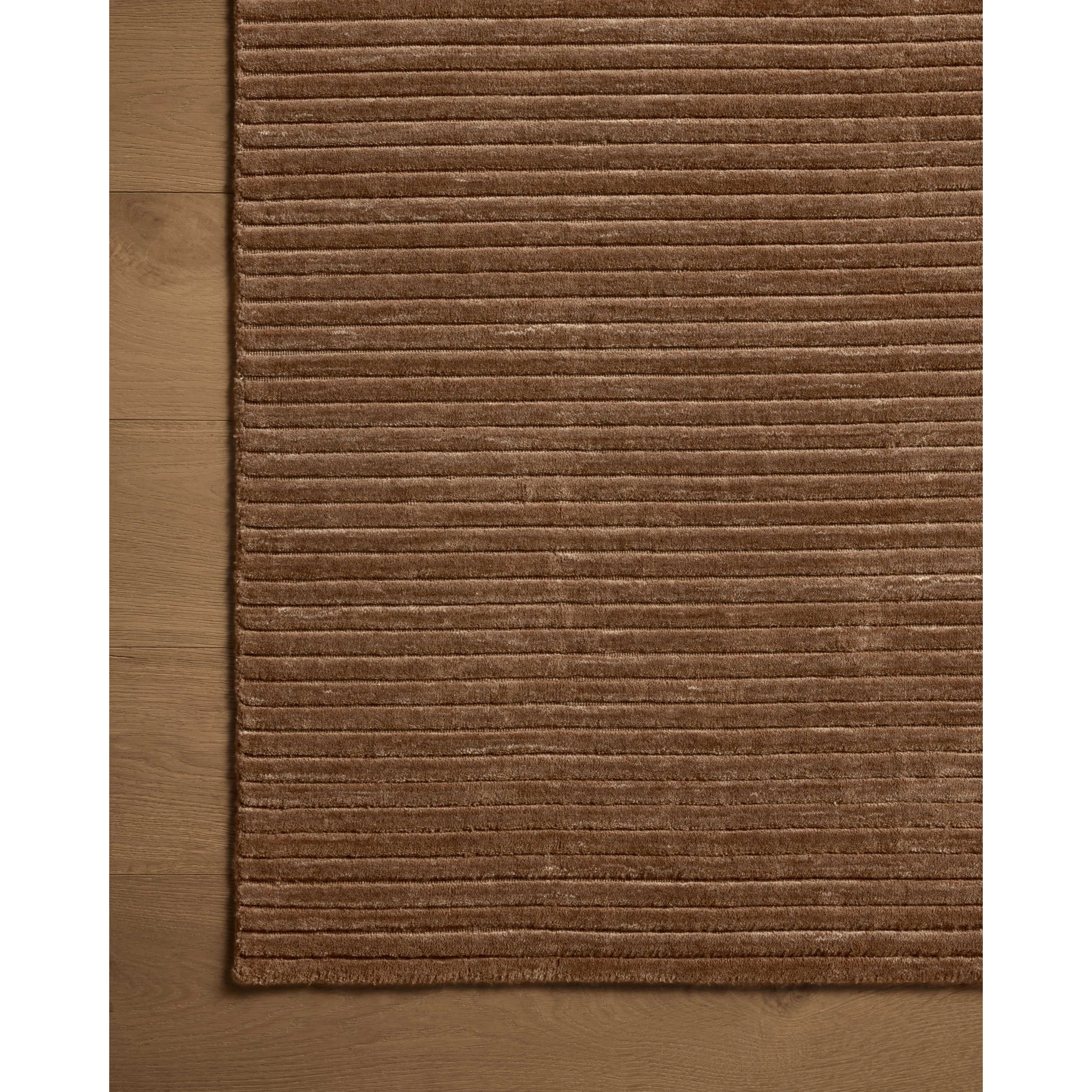 Featuring Sterling Mocha Rug by Loloi at Amethyst Home. Sophisticated ribbing runs across the Sterling Mocha Rug, a nicely textured area rug with a natural color palette rich in tonality. Sterling is hand-loomed of polyester that’s refreshingly easy to clean and withstands high-traffic in living rooms, dining rooms, or bedrooms. This collection is made in In. Amethyst Home provides interior design, new home construction design consulting, vintage area rugs, and lighting in the Monterey metro area.