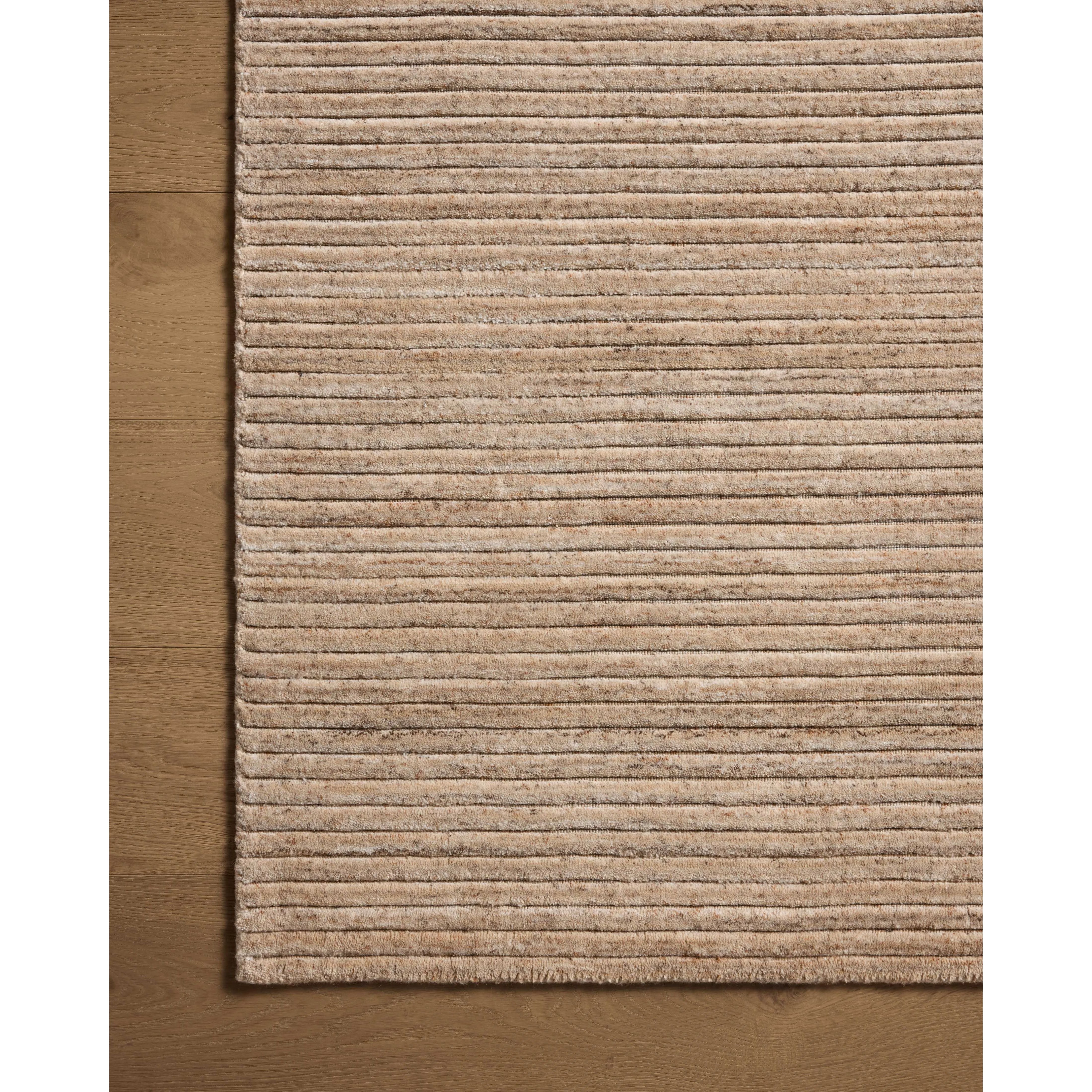 Featuring Sterling Natural Rug by Loloi at Amethyst Home. Sophisticated ribbing runs across the Sterling Collection, a nicely textured area rug with a natural color palette rich in tonality. Sterling is hand-loomed of polyester that's refreshingly easy to clean and withstands high-traffic in living rooms, dining rooms, or bedrooms. This collection is ma. Amethyst Home provides interior design, new home construction design consulting, vintage area rugs, and lighting in the Newport Beach metro area.
