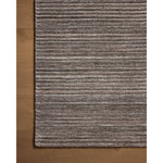 Featuring Sterling Stone Rug by Loloi at Amethyst Home. Sophisticated ribbing runs across the Sterling Collection, a nicely textured area rug with a natural color palette rich in tonality. Sterling is hand-loomed of polyester that's refreshingly easy to clean and withstands high-traffic in living rooms, dining rooms, or bedrooms. This collection is made in Ind. Amethyst Home provides interior design, new home construction design consulting, vintage area rugs, and lighting in the Boston metro area.