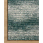 Featuring Sunday Ocean / Ivory Rug by Loloi at Amethyst Home. The Sunday Collection is a home-friendly, hand-tufted area rug with a pinstripe pattern in varied, vibrant tones. The rugs textured pile brings even more dimension and depth to this classic yet playful design. The Sunday Collection is hand-tufted of wool in India and Goodweave-certified, ensuri. Amethyst Home provides interior design, new home construction design consulting, vintage area rugs, and lighting in the Los Angeles metro area.