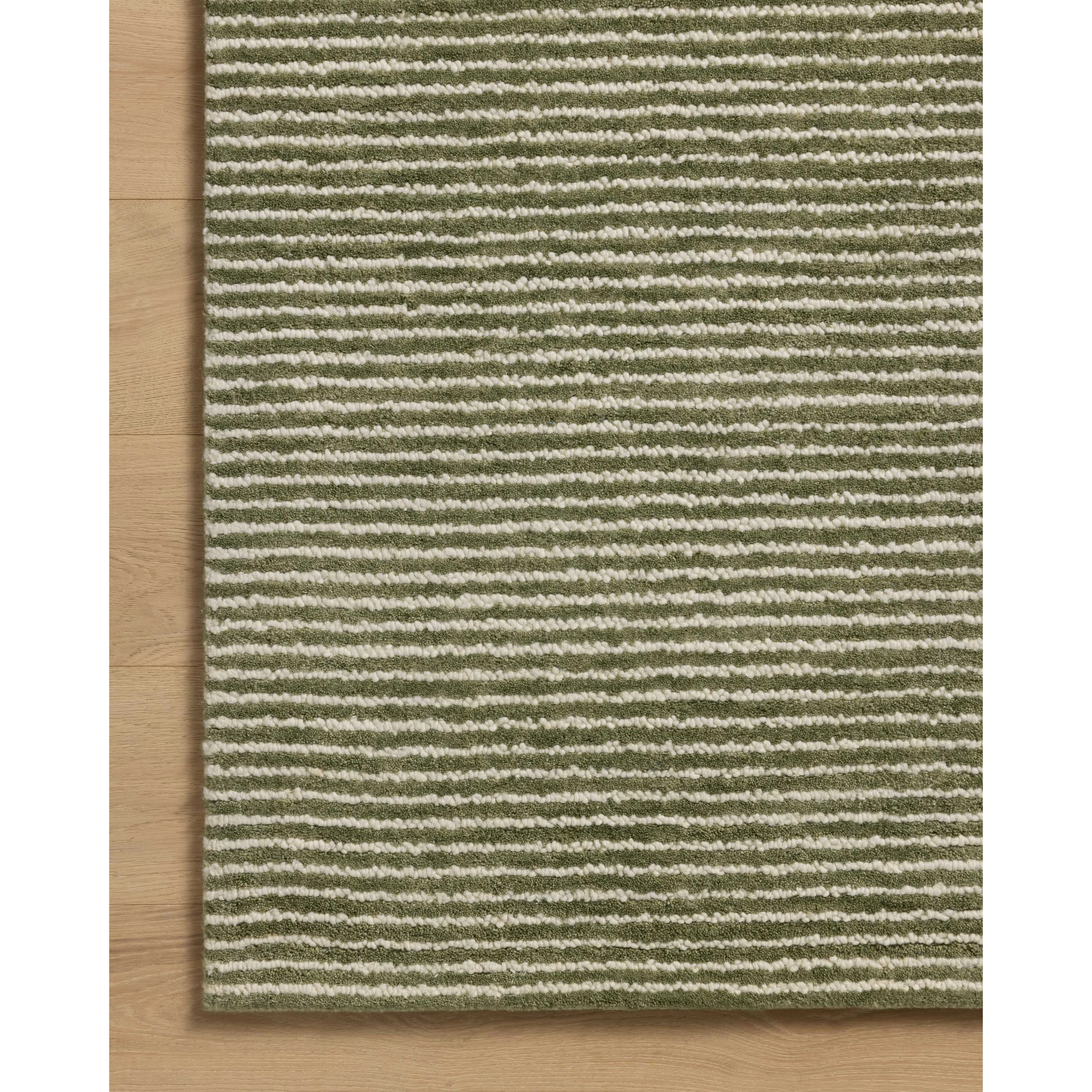 Featuring Sunday Olive / Ivory Rug by Loloi at Amethyst Home. The Sunday Collection is a home-friendly, hand-tufted area rug with a pinstripe pattern in varied, vibrant tones. The rugs textured pile brings even more dimension and depth to this classic yet playful design. The Sunday Collection is hand-tufted of wool in India and Goodweave-certified, ensuring our. Amethyst Home provides interior design, new home construction design consulting, vintage area rugs, and lighting in the Miami metro area.