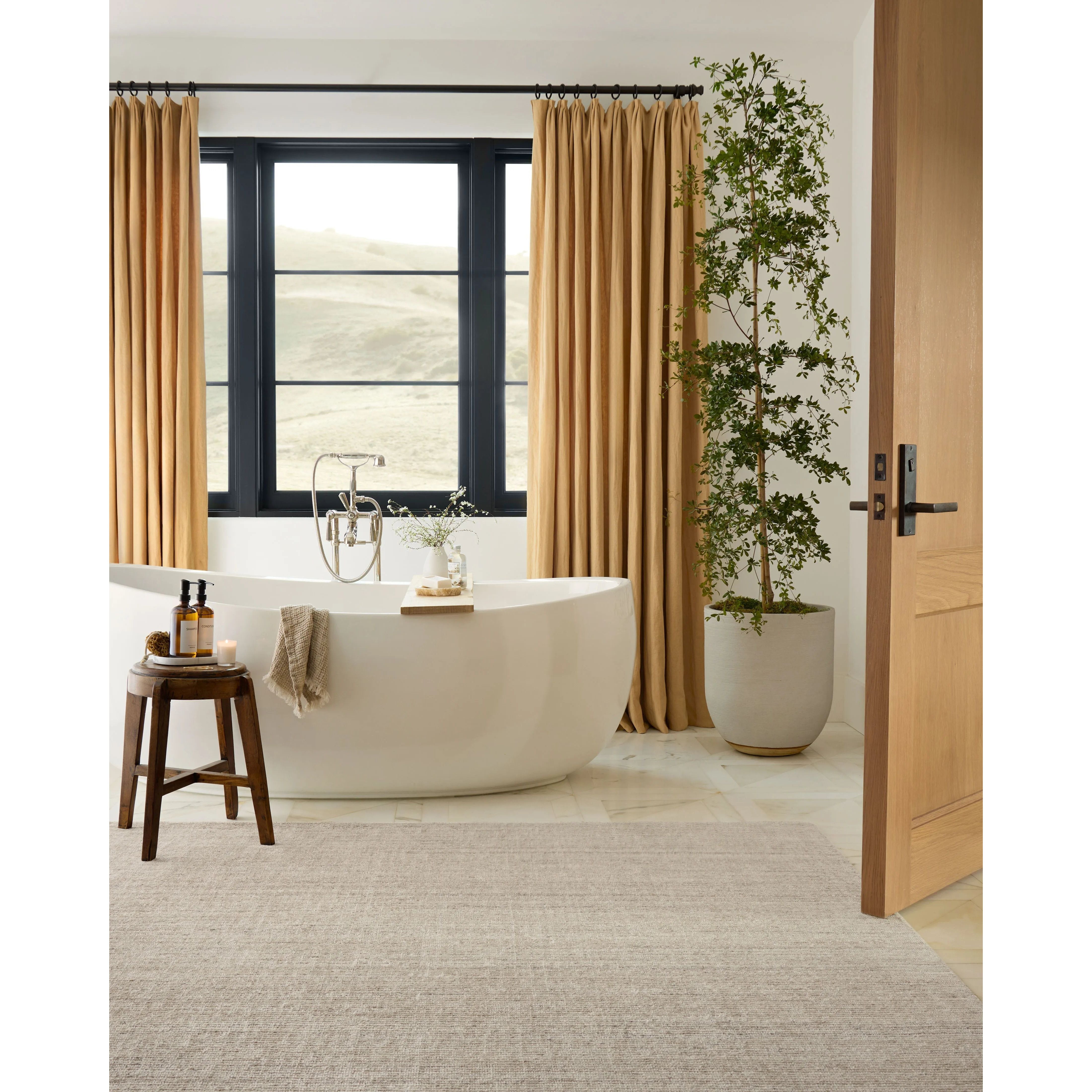 Featuring Thorne Natural Rug by Loloi at Amethyst Home. The Thorne Collection is a hand-loomed area rug with thin, textured lines. The rug's neutral, heathered tones add levity to living rooms, coziness to bedrooms, and casual warmth to dining rooms. Thorne is loomed of durable, easy-to-clean polyester in India and GoodWeave-certified, ensuring our commitment t. Amethyst Home provides interior design, new home construction design consulting, vintage area rugs, and lighting in the Omaha metro area.