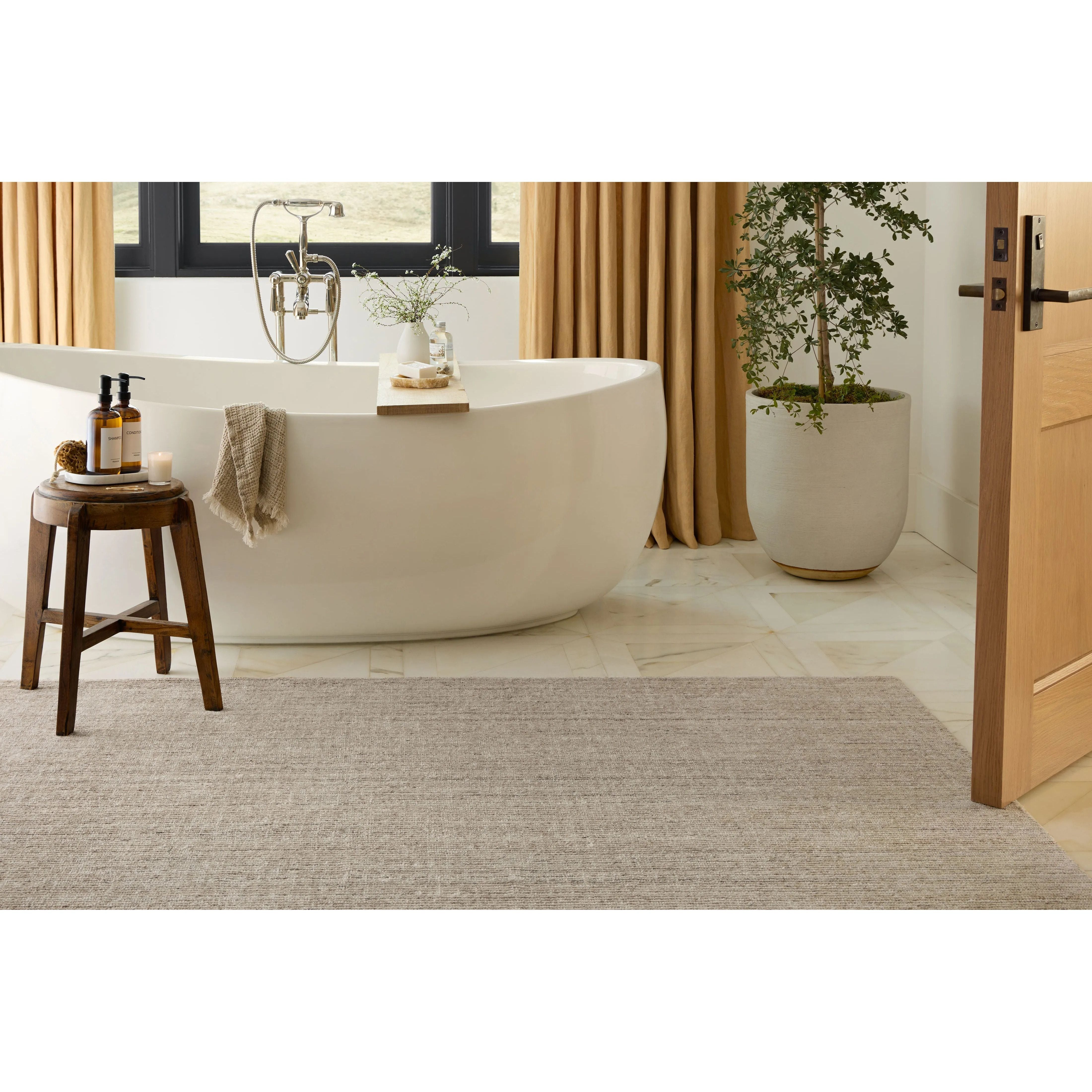 Featuring Thorne Natural Rug by Loloi at Amethyst Home. The Thorne Collection is a hand-loomed area rug with thin, textured lines. The rug's neutral, heathered tones add levity to living rooms, coziness to bedrooms, and casual warmth to dining rooms. Thorne is loomed of durable, easy-to-clean polyester in India and GoodWeave-certified, ensuring our commitment t. Amethyst Home provides interior design, new home construction design consulting, vintage area rugs, and lighting in the Tampa metro area.