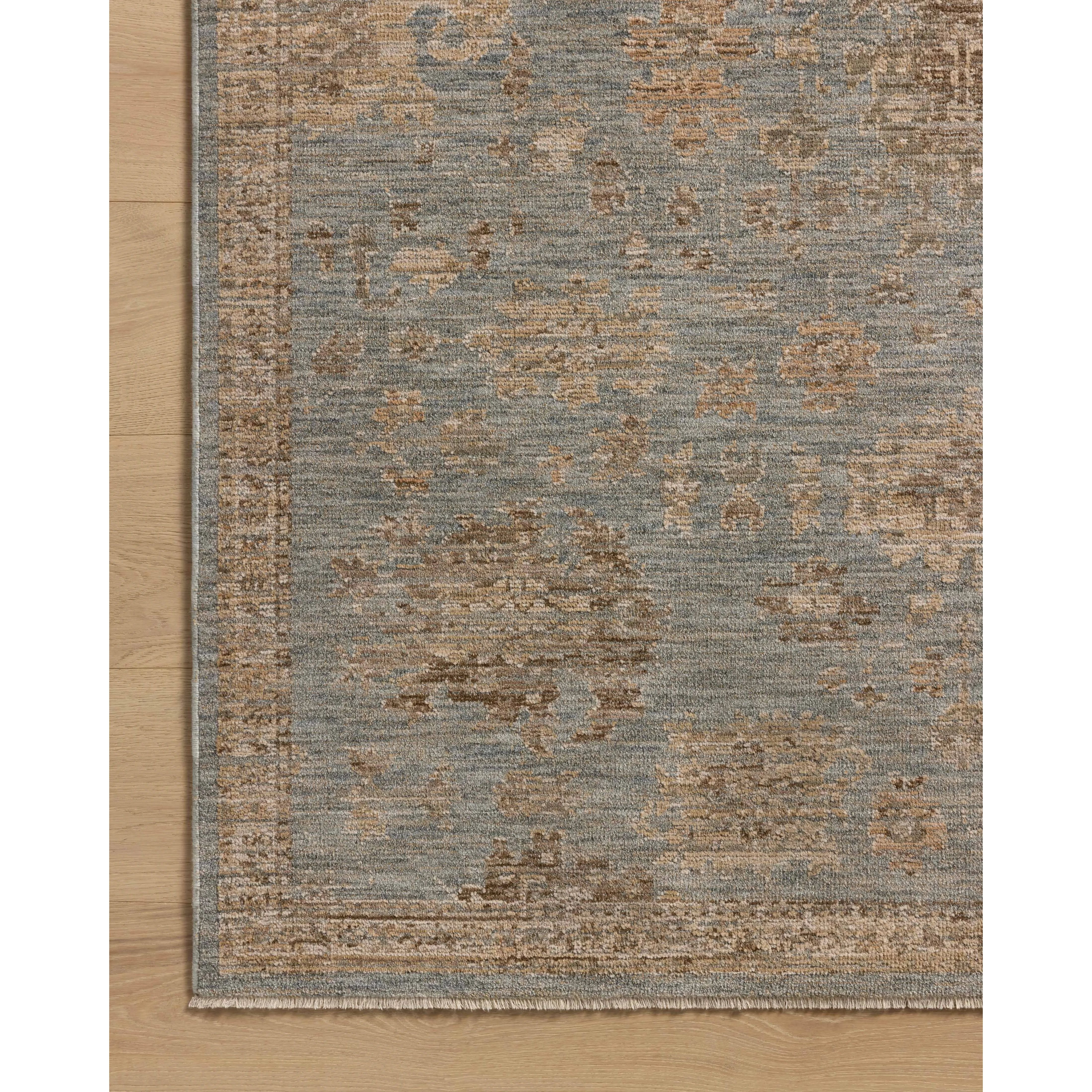 Featuring Willa Sky / Natural Rug by Loloi at Amethyst Home. The Willa Collection is a power-loomed area rug based on traditional Turkish motifs that ebb and flow across the design with the yarns shifting tones. The rugs vintage-style design and light palettes with tones of sand and pale sky is elegantly neutral for living rooms, bedrooms, hallways, and mo. Amethyst Home provides interior design, new home construction design consulting, vintage area rugs, and lighting in the Washington metro area.