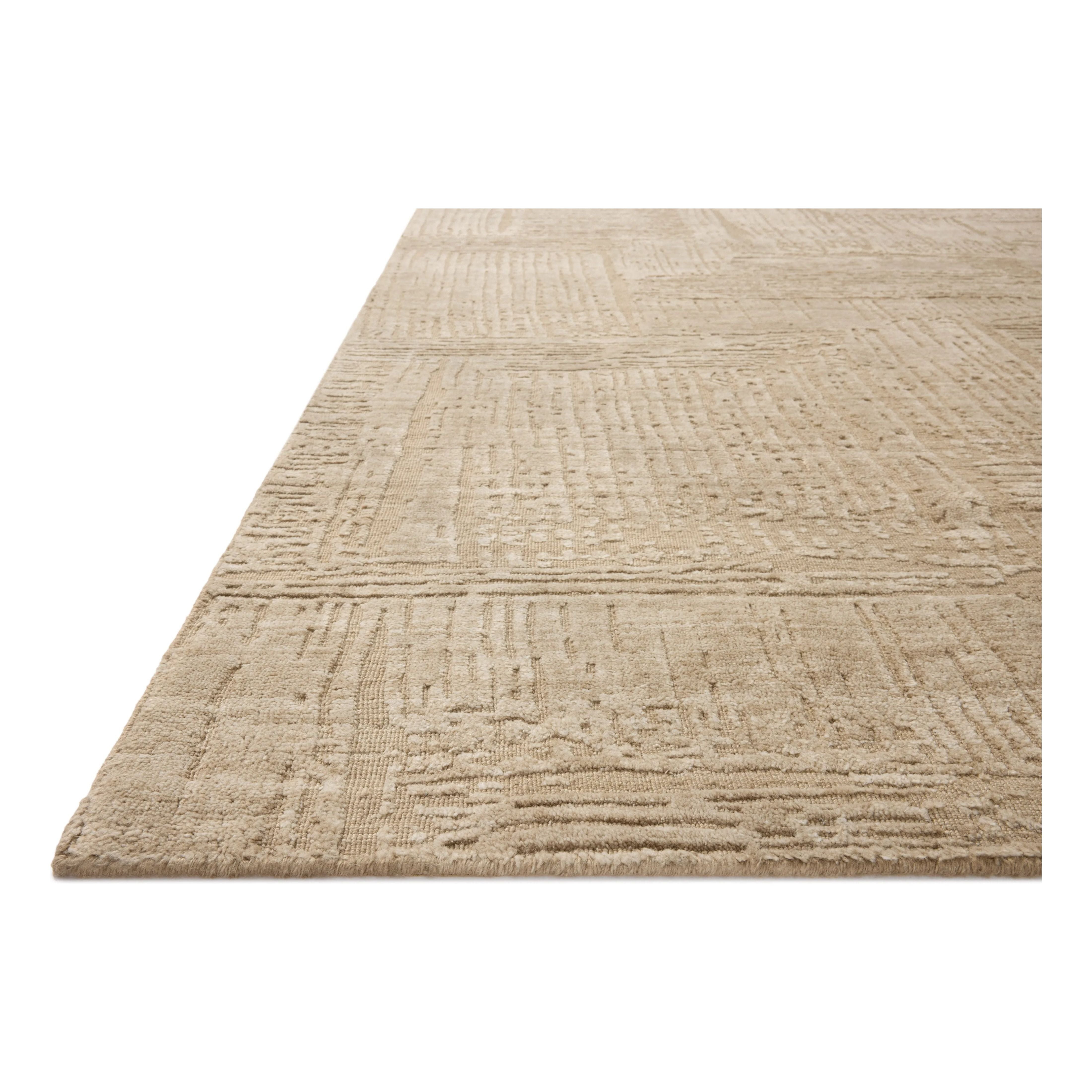 Featuring Woods Oatmeal Rug by Loloi at Amethyst Home. The Woods Collection is a hand-woven area rug with a solid-colored, textured design for elevated home decor. It has a blended wool and rayon pile that is saturated with color and has a subtle sheen, a beautiful rug for living rooms, bedrooms, and more. This collection is made in India and Goodweave-cert. Amethyst Home provides interior design, new home construction design consulting, vintage area rugs, and lighting in the Nashville metro area.