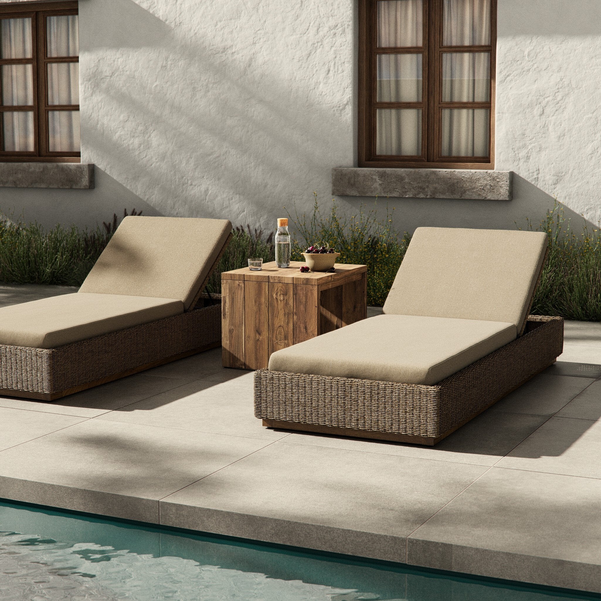Featuring Lorelei Alessi Buff Outdoor Chaise by Four Hands at Amethyst Home. A slim, stylish profile invites outdoor lounging. The woven box base frames durable, outdoor-friendly cushioning in soft buff. An adjustable back offers personalized comfort, while the wooden plinth elevates the sleek design. Cover or store indoors during inclement weather and when not in use.Overall Dimensi. Amethyst Home provides interior design, new construction, custom furniture, and area rugs in the Boston metro area