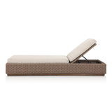 Featuring Lorelei Alessi Buff Outdoor Chaise by Four Hands at Amethyst Home. A slim, stylish profile invites outdoor lounging. The woven box base frames durable, outdoor-friendly cushioning in soft buff. An adjustable back offers personalized comfort, while the wooden plinth elevates the sleek design. Cover or store indoors during inclement weather and when not in use.Overall Dimensio. Amethyst Home provides interior design, new construction, custom furniture, and area rugs in the Omaha metro area