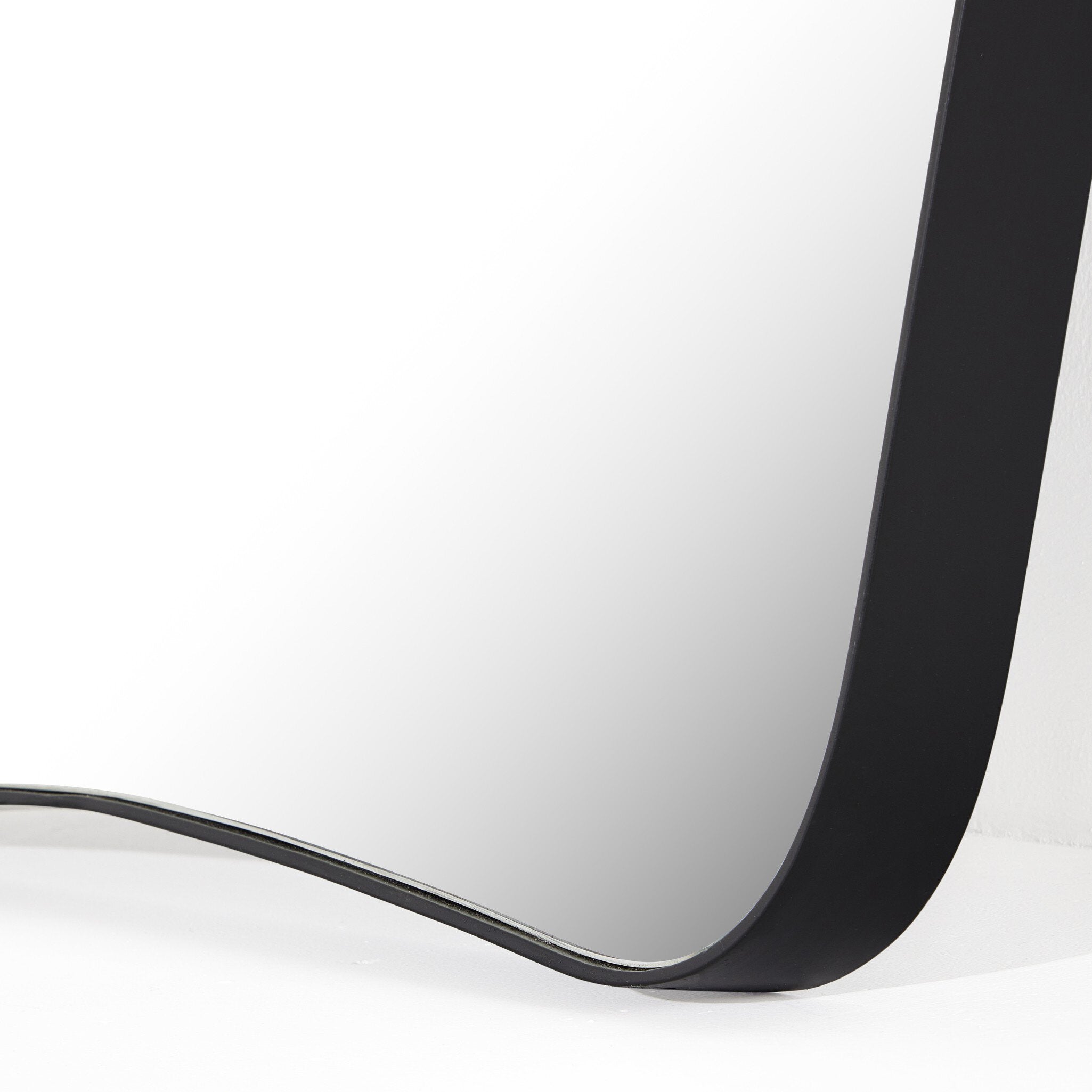 Featuring Merona Iron Matte Black Mantel Mirror by Four Hands at Amethyst Home. A swooped silhouette creates rounded corners while maintaining a sleek overall look.Overall Dimensions: 39.00"w x 2.00"d x 44.00"hWeight : 66.40 lbsMaterials : Iron, Mirror, Engineered Hardwood. Amethyst Home provides interior design, new construction, custom furniture, and area rugs in the Portland metro area