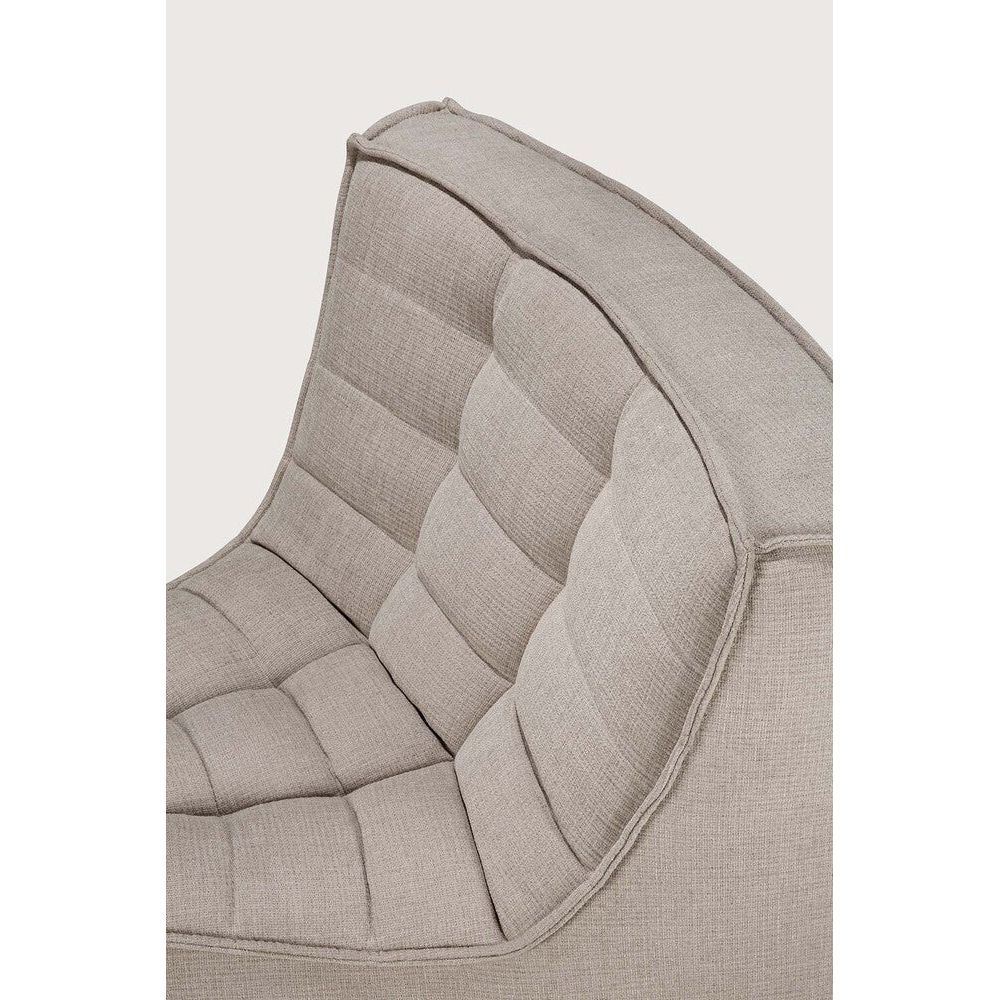 Featuring N701 Ecru 45° Round Corner Modular Sofa Piece by Ethnicraft at Amethyst Home. The N701 sofa is an inviting design that oozes comfort and relaxation. By combining the different modules and sizes, you have unlimited possibilities when it comes to creating your own unique setting.Weight : 30 lbs Dimensions: 39" W x 33" L x 30" H. Amethyst Home provides interior design, new construction, custom furniture, and area rugs in the Boston metro area