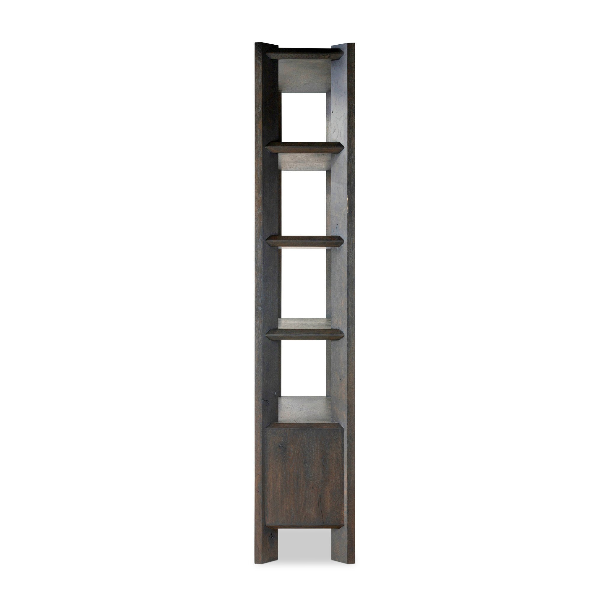 Featuring Orwin Smoked Black Oak Bookshelf by Four Hands at Amethyst Home. A stunner from every angle. Crafted from a mix of solid oak and thick oak veneer, this generous bookcase features chamfered edges along the shelves and angled outer legs for lots of movement. Finished in a smoked black oak finish.Overall Dimensions: 44.00"w x 18.00"d x 94.00"hWeight : 253.53 lbsMaterials : Sol. Amethyst Home provides interior design, new construction, custom furniture, and area rugs in the Dallas metro area
