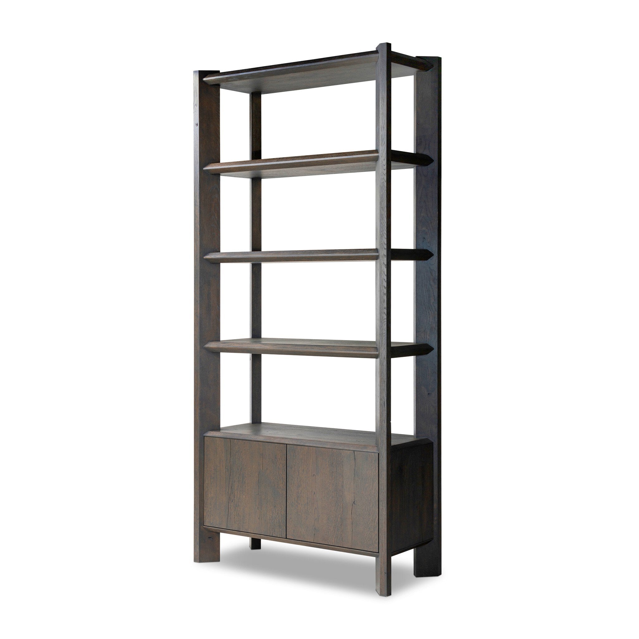 Featuring Orwin Smoked Black Oak Bookshelf by Four Hands at Amethyst Home. A stunner from every angle. Crafted from a mix of solid oak and thick oak veneer, this generous bookcase features chamfered edges along the shelves and angled outer legs for lots of movement. Finished in a smoked black oak finish.Overall Dimensions: 44.00"w x 18.00"d x 94.00"hWeight : 253.53 lbsMaterial. Amethyst Home provides interior design, new construction, custom furniture, and area rugs in the Winter Garden metro area