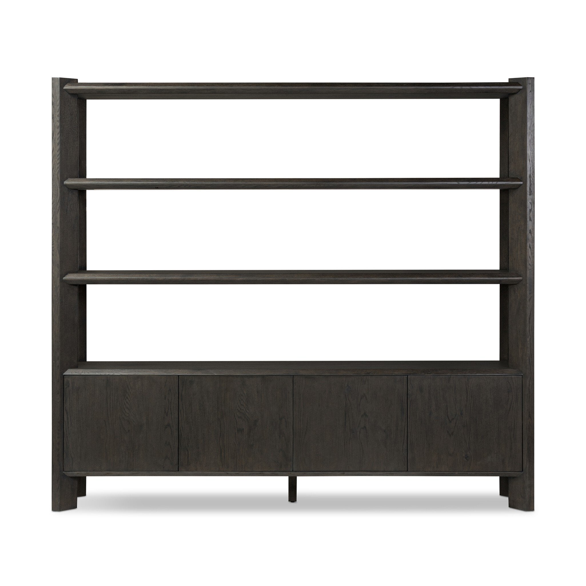 Featuring Orwin Smoked Black Oak Wide Bookshelf by Four Hands at Amethyst Home. A stunner from every angle. Crafted from a mix of solid oak and thick oak veneer, this overscale bookcase features chamfered edges along the shelves and angled outer legs for lots of movement. Finished in a smoked black oak.Overall Dimensions: 84.00"w x 18.00"d x 77.00"hWeight : 326.28 lbsMaterials : S. Amethyst Home provides interior design, new construction, custom furniture, and area rugs in the Park City metro area