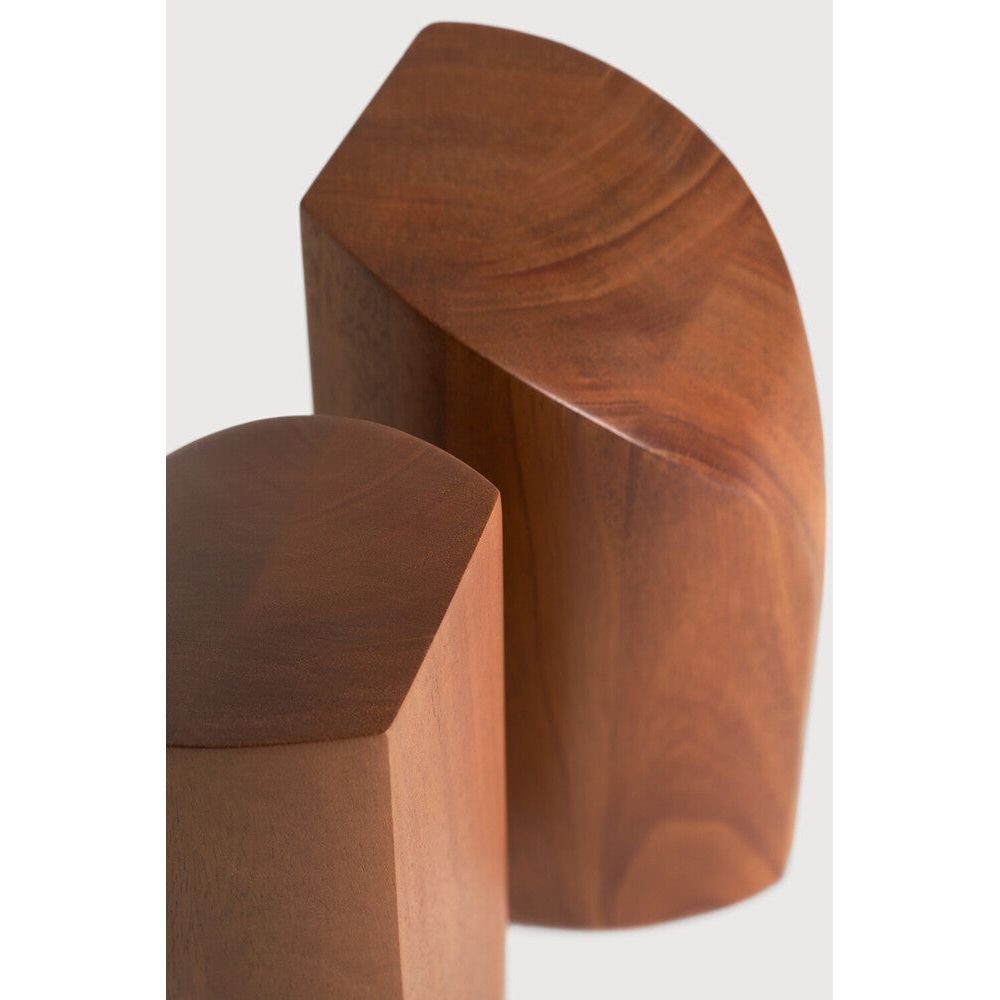 Featuring Pi Mahogany Book Ends by Ethnicraft at Amethyst Home. The PI collection honours nature’s design by keeping the strength, curves and lines, as nature intended. Each PI book end is finished by hand to ensure that the individual character of the wood is respected. Interesting shapes are discovered in this sleek and stylish, polished imperfect, finish. Designed by Alain van . Amethyst Home provides interior design, new construction, custom furniture, and area rugs in the San Diego metro area